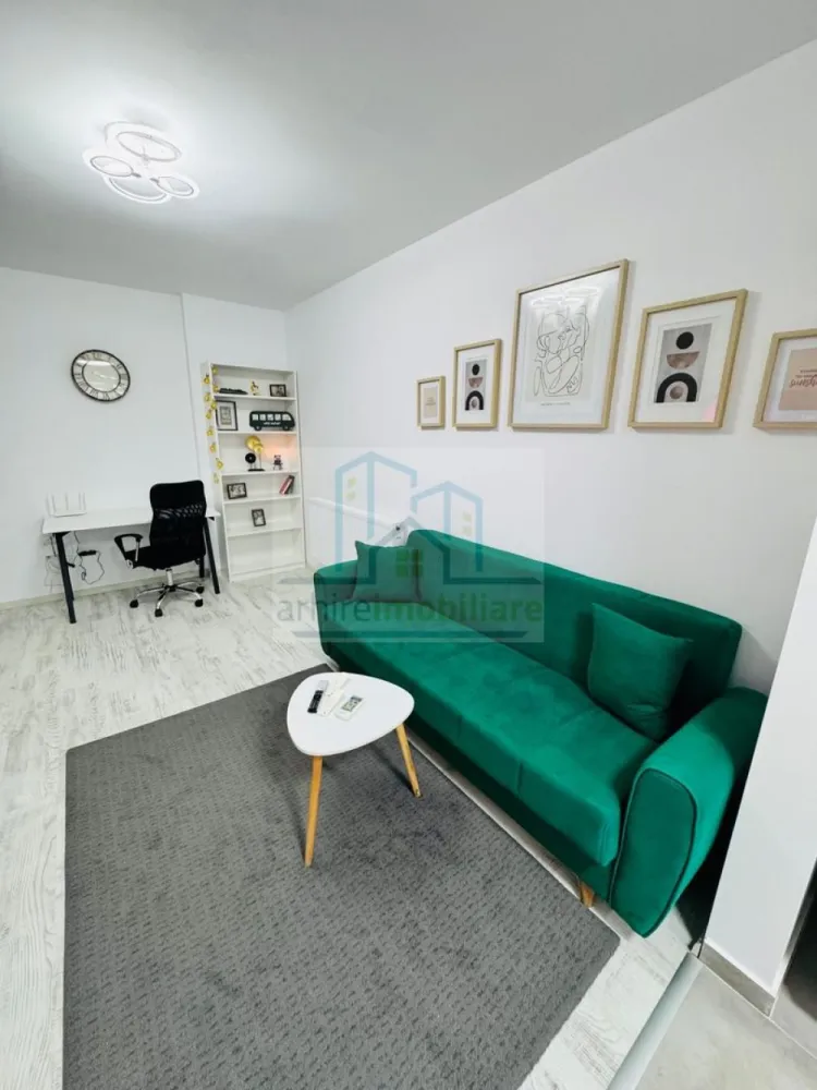 Apartament 2camere open space Popesti Leordeni, strada Biruintei - Agentia ArhireImobiliare va ofera spre vanzare un apartament cu 2 camere tip studio, apartamentul este situat la etajul 6 din 6 , finalizare bloc anul 2024, lift modern. 
Apartamentul beneficiaza de balcon inchis in termopan , cetrala proprie, aer conditionat ,plita pe gaz, cuptor electric,masina de spalat, frigider cuptor cu microunde, tv smart. Toate sunt achizitionate noi.
La parterul blocului regasim ciorbarie, Studio pilates, cafenea tip to go , frizerie , parc privat.
In imediata apropriere gasim magazine mixte ,mega image, carrefour express, penny ,parc public, restaurante, Sali de fitness, piscina.
La o distanta de maxim 5-6 minute se regaseste campusul format din cresa, gradinita si scoala toate fiind de stat.
Distanta pana la metrou este de aproximativ 12-15 minute de mers pe jos. Vizavi de campus se regaseste statia de autobuz ce face legatura cu metrou Berceni. 

Apartamentul se vinde complet mobilat si utilat

Mutare imediata.

Pretul de vanzare este de 85000 Euro Usor Negociabil .

Va asteptam la vizionare