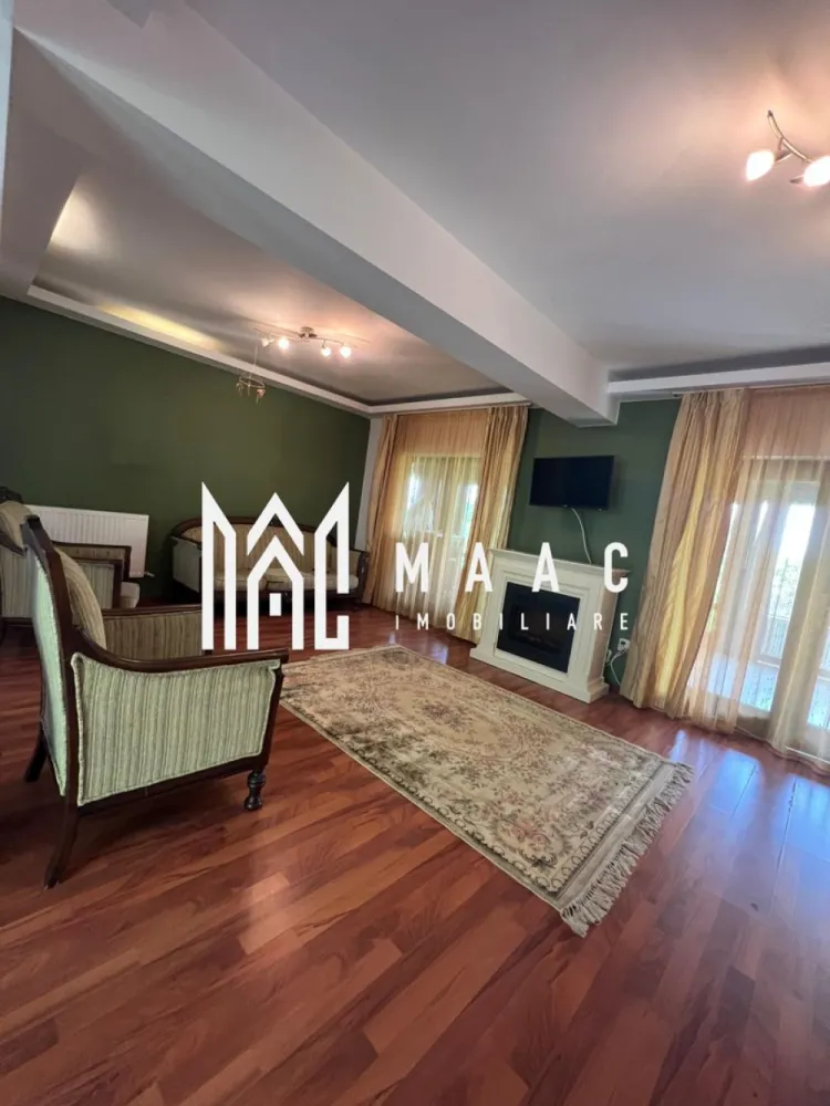 Vila | Ramnicu Valcea | Lenin Sud | De inchiriat - MAAC Imobiliare vă propune spre închiriere o vilă modernă D+P+1, situată în cartierul Lenin Sud din Râmnicu Vâlcea, într-o zonă liniștită, cu vedere panoramică deosebită și acces facil către principalele puncte de interes ale orașului.

Proprietatea are o suprafață utilă de 150 mp și este complet mobilată și utilată, fiind pregătită pentru mutare imediată. Compartimentarea este realizată inteligent pentru a oferi confort și funcționalitate, vila dispunând de un living spațios și luminos, bucătărie complet echipată, două dormitoare primitoare, cameră de dressing și două grupuri sanitare.

Unul dintre punctele forte ale proprietății este terasa generoasă închisă cu sticlă, un spațiu versatil ce poate fi utilizat pe tot parcursul anului, ideal pentru relaxare, socializare sau zonă de dining cu priveliște panoramică.

Locuința beneficiază de centrală termică proprie pe gaz, asigurând confort termic și eficiență pe tot parcursul anului.

În plus, imobilul dispune de garaj subteran, oferind siguranță și confort pentru autoturism.

Această proprietate reprezintă alegerea ideală pentru persoanele care își doresc liniște, spațiu și un ambient modern într-una dintre cele mai apreciate zone rezidențiale din Râmnicu Vâlcea.

Pentru mai multe detalii și programarea unei vizionări, echipa MAAC Imobiliare vă stă la dispoziție.

ID: CP3080060