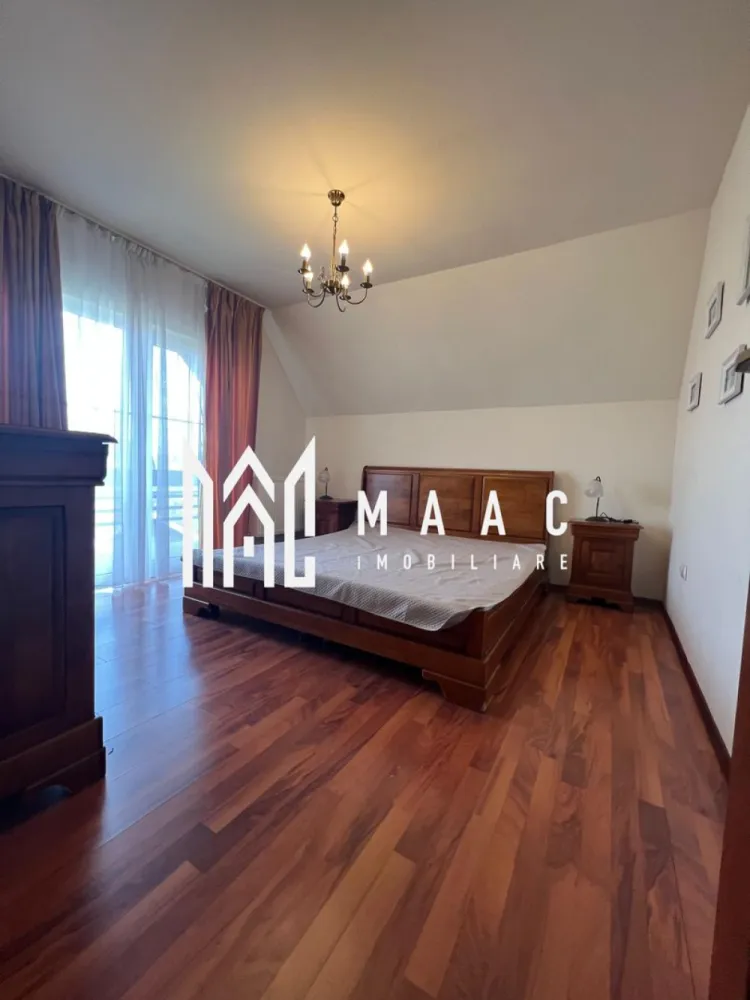 Vila | Ramnicu Valcea | Lenin Sud | De inchiriat - MAAC Imobiliare vă propune spre închiriere o vilă modernă D+P+1, situată în cartierul Lenin Sud din Râmnicu Vâlcea, într-o zonă liniștită, cu vedere panoramică deosebită și acces facil către principalele puncte de interes ale orașului.

Proprietatea are o suprafață utilă de 150 mp și este complet mobilată și utilată, fiind pregătită pentru mutare imediată. Compartimentarea este realizată inteligent pentru a oferi confort și funcționalitate, vila dispunând de un living spațios și luminos, bucătărie complet echipată, două dormitoare primitoare, cameră de dressing și două grupuri sanitare.

Unul dintre punctele forte ale proprietății este terasa generoasă închisă cu sticlă, un spațiu versatil ce poate fi utilizat pe tot parcursul anului, ideal pentru relaxare, socializare sau zonă de dining cu priveliște panoramică.

Locuința beneficiază de centrală termică proprie pe gaz, asigurând confort termic și eficiență pe tot parcursul anului.

În plus, imobilul dispune de garaj subteran, oferind siguranță și confort pentru autoturism.

Această proprietate reprezintă alegerea ideală pentru persoanele care își doresc liniște, spațiu și un ambient modern într-una dintre cele mai apreciate zone rezidențiale din Râmnicu Vâlcea.

Pentru mai multe detalii și programarea unei vizionări, echipa MAAC Imobiliare vă stă la dispoziție.

ID: CP3080060