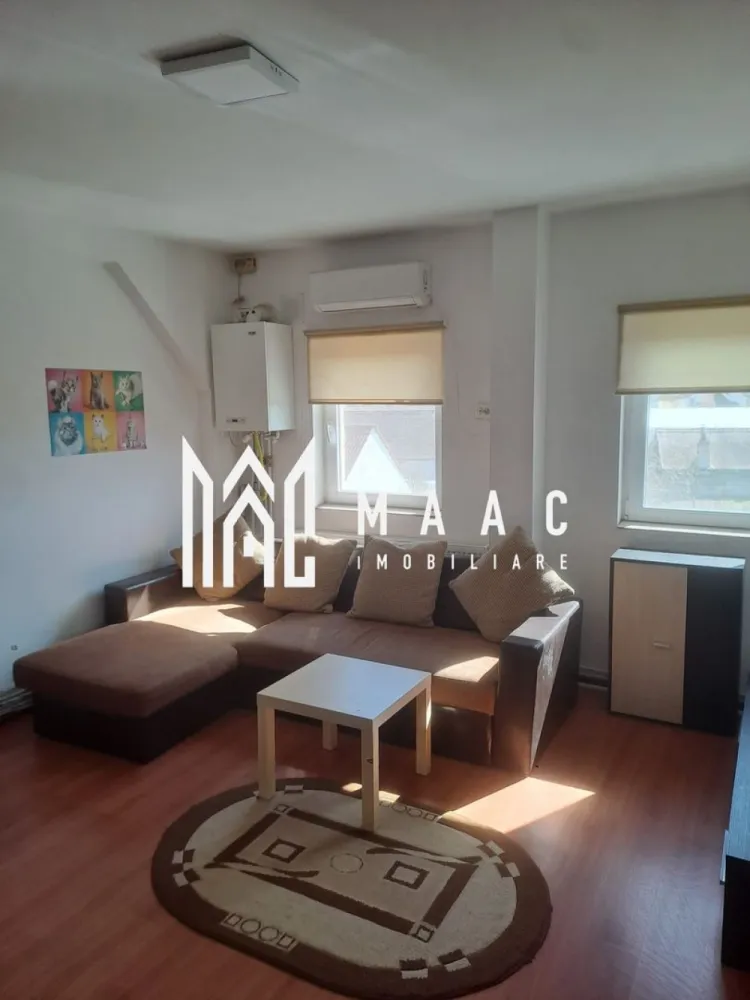 Apartament la Vilă | 3 camere | 84MPU | Gușterița - MAAC Imobiliare vă propune spre închiriere un apartament situat în zona Gușterița, o locație ideală, pentru cei care caută liniștea unei zone de case, fără a renunța la accesibilitatea urbană. 

Proprietatea beneficiază de o poziționare strategică, fiind situată în imediata apropiere a :

stației de autobuz (linii 10, 14, 118...) și la doar câteva minute de zona industrială de est și accesul pe autostradă

În proximitate se regăsește și dealul Gușteriței, renumit pentru panorama sa deosebită asupra orașului.

De asemenea, este în curs de dezvoltare proiectul Gușterland pe dealurile din apropiere, care v-a include trasee de cicloturism, zone de belvedere și facilități de agrement, iar pe aceeași stradă se lucrează la construcția unei noi grădinițe moderne.

Apartamentul este de tip mansardă, situat la etajul 2 al unei vile, oferind intimitatea și confortul unei locuințe la casă. 

Locuința dispune de loc de parcare privat în curtea interioară a imobilului.

Interiorul este finisat modern și se predă complet mobilat și utilat, fiind dotat cu centrală proprie, calorifere, aer condiționat, ferestre tip PVC cu rulouri interioare manuale.

Compartimentarea este de tip decomandat, având o suprafață utilă de 84 mp, structurată astfel:
3 camere
2 dormitoare 
1 bucătărie
1 baie

Dotări și utilități:
Aragaz
Hotă
Frigider
Mașină de spălat rufe
Cabină de duș

Condiții de închiriere:
Se caută chiriași pe termen lung.
Nu se acceptă animale de companie.
Garanția în cuantumul unei chirii lunare, iar în cazul unei familii cu copii, garanția se percepe în cuantumul a 3 chirii lunare.

Pentru mai multe detalii și programarea unei vizionări,nu ezitați să ne contactați specificând telefonic că ați văzut anunțul cu codul de identificare al proprietății ID: CP3083098