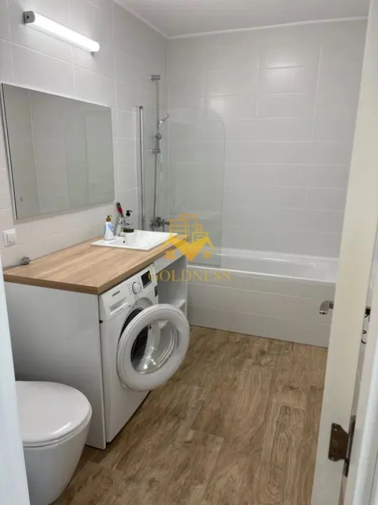 2 camere, modern, garaj, bloc nou, Europa zona Eugen Ionesco, Luminia - GOLDNESS Imobiliare vă propune spre închiriere un apartament cu 2 camere complet mobilat și utilat, la etajul 1 într-un imobil de 6 etaje, în Cartierul Europa.
Se poate inchiria parcare cu 50 euro!
Se află în apropierea stațiilor de transport în comun, magazine, restaurante, spații verzi, farmacii, etc. 

Apartamentul este compartimentat astfel:
 - dormitor cu pat matrimonial, dressing, noptiere
 - living cu bucatarie open space complet utilată, canapea extensibilă, loc de servit masa 
 - baie cu cada, calorifer port prosop și dulap pentru depozitare.
 - terasa de 11 mp.

Imobilul este dotat cu toate cele necesare- centrală proprie, mașină de spălat haine, masina de spalat vase, frigider, plită electrică, hotă, etc. 

Dacă sunteți interesați de acest apartament și doriți să îl vizionați, dar și pentru alte oferte nu ezitați să ne contactați telefonic sau prin e-mail. Vă stăm la dispoziție!

Pentru intermediere se percepe un comision de 50% din prețul chiriei!