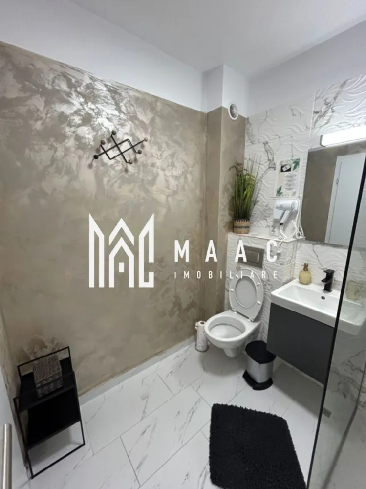 Apartament 2 Camere | 40,8 mp | Loc de parcare | Pivniță | Complex Henri Coandă - MAAC Imobiliare vă propune spre vânzare un apartament modern cu 2 camere, situat în complexul rezidențial Henri Coandă – o alegere ideală atât pentru locuit, cât și pentru investiție.

Locuința dispune de o suprafață utilă de 40,8 mp și este compartimentată inteligent, oferind un ambient plăcut și funcțional:

dormitor luminos, amenajat cu bun gust
living spațios cu bucătărie open-space, perfect pentru relaxare și socializare
baie modernă, dotată cu finisaje de calitate
terasă ideală pentru momentele de relaxare

Un mare avantaj al proprietății îl reprezintă locul de parcare propriu și pivnița, oferind spațiu suplimentar pentru depozitare și un plus de confort în viața de zi cu zi.

Apartamentul se vinde complet mobilat și utilat, fiind amenajat cu atenție la detalii, într-un stil modern și elegant. Finisajele premium și dotările de calitate asigură un nivel ridicat de confort, fiind pregătit pentru mutare imediată sau continuarea activității investiționale.

În prezent, proprietatea este exploatată în regim hotelier, generând un venit atractiv pentru proprietari, ceea ce o transformă într-o oportunitate excelentă pentru cei care își doresc o investiție sigură și profitabilă.

În total sunt disponibile 4 apartamente de acest tip, situate de la parter până la etajul 3, oferind posibilitatea de a alege varianta potrivită în funcție de preferințele dumneavoastră.

Datorită amplasării într-o zonă în continuă dezvoltare, cu acces facil către punctele de interes, acest apartament îmbină perfect confortul cu potențialul investițional.

Pentru mai multe detalii sau pentru a programa o vizionare, vă rugăm să ne contactați și să specificați ID:CP3065638