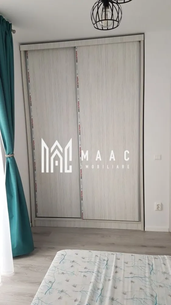 Apartament 2 camere | 54 MPU | Lazaret - MAAC Imobiliare vă propune spre închiriere un apartament modern cu 2 camere, complet mobilat și utilat, ideal pentru persoanele care își doresc confort, spații generoase și o locuință primitoare.
Apartamentul se remarcă prin compartimentarea practică, mobilierul modern, numeroasele spații de depozitare și balconul generos de 16 mp, perfect pentru relaxare.

Compartimentare:
-living spațios
-bucătărie separată
-dormitor matrimonial
-baie cu geam
-hol
-terasa de 16 mp

Dotări și avantaje:
-dormitor cu pat matrimonial și ladă pentru depozitare
-dressing generos în dormitor
-living mare cu colțar comod
-dressing mare în living pentru depozitare
-mobilier modern și funcțional
-bucătărie separată complet utilată
-cuptor electric
-plită pe gaz
-cuptor cu microunde
-hotă
-combină frigorifică
-baie spațioasă cu cabină de duș și geam pentru aerisire naturală
-mașină de spălat haine
-apartament complet mobilat și utilat modern
-balcon generos de 16 mp

Condiții:
-disponibilitate: de la sfarsitul lunii mai

Pentru mai multe detalii sau pentru programarea unei vizionări, vă rugăm să ne contactați specificând: ID CP3087164.