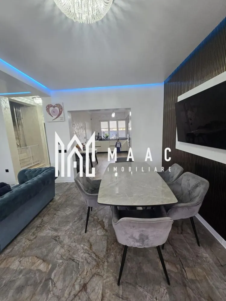 Casa 4 camere | Curte si terasa | Selimbar - MAAC Imobiliare vă prezinta o proprietate modernă și elegantă, situată într-o zona rezidențiala din Șelimbăr, ideală pentru cei care își doresc confort, intimitate.

Această casă tip duplex dispune de o suprafață utilă de 111 mp, fiind compartimentată inteligent pentru a răspunde perfect nevoilor unei familii moderne. Locuința beneficiază de 3 dormitoare spațioase și luminoase, amenajate cu bun gust, oferind un ambient relaxant și primitor.

Zona de zi impresionează prin livingul generos în concept open space cu bucătăria complet mobilată și utilată, un spațiu ideal pentru petrecerea timpului alături de familie și prieteni. Designul modern, finisajele premium și mobilierul atent ales creează o atmosferă elegantă și rafinată în fiecare încăpere.

Proprietatea dispune de 2 băi complet echipate, amenajate cu materiale și obiecte sanitare de calitate superioară, punând accent pe confort și funcționalitate.

Casa este finisată și mobilată lux, pregătită pentru mutare imediată, fără a necesita investiții suplimentare. În plus, terenul aferent de 226 mp oferă un spațiu perfect pentru relaxare, terasă si loc de joacă.

Pentru mai multe detalii si programarea unei vizionari, va rugam specificati ca ati vazut anuntul cu ID: CP3088092