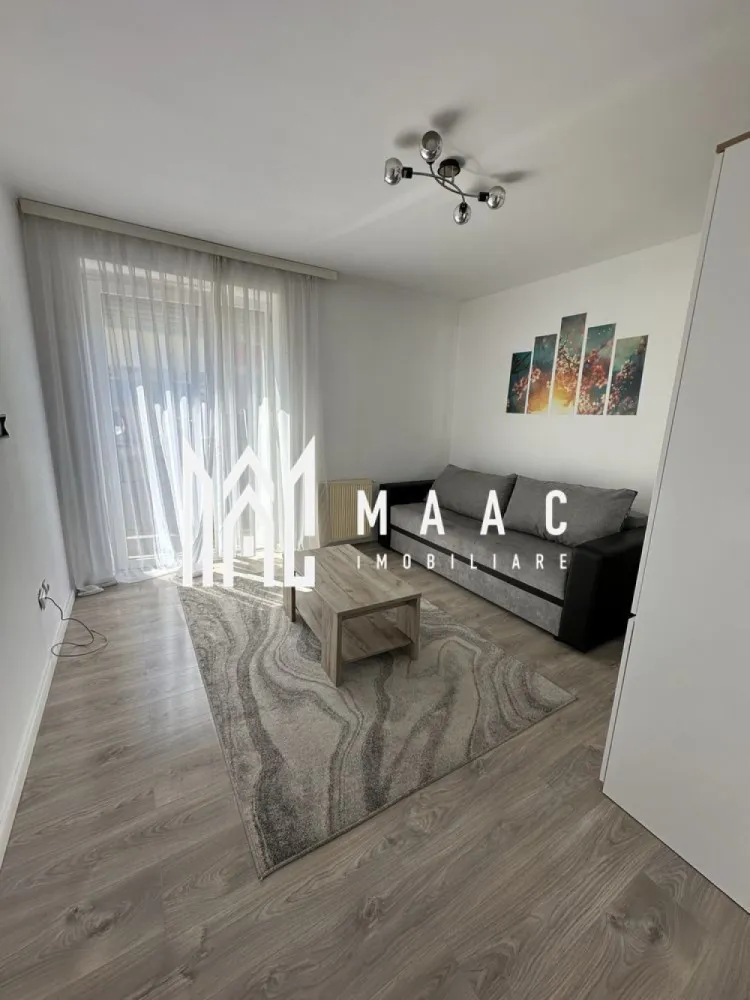 Apartament 1 Camera I Decomandat I Parter I Alma-Turnisor - Se oferă spre vânzare garsonieră decomandată, cu o suprafață de 31 mp, situată la parterul unui imobil construit după anul 2000, într-o zonă urbană apreciată pentru accesibilitate și proximitatea față de facilitățile importante ale orașului.

Locuința este complet mobilată și utilată, fiind ideală atât pentru locuire proprie, cât și pentru investiție.

Caracteristici:
Suprafață utilă: 31 mp
Compartimentare decomandată
Balcon – spațiu ideal pentru relaxare
Complet mobilată și utilată
Loc de parcare inclus
Situată la parter
Imobil construit după anul 2000

Avantaje:
Disponibilă imediat
Ideală pentru investiție / închiriere
Costuri reduse de întreținere
Compartimentare practică și eficientă
Mutare rapidă, fără investiții suplimentare

Localizare:
Aproape de magazine, centre medicale, școli și zone verzi
Stații de autobuz în apropiere
Acces facil către principalele puncte de interes ale orașului

O proprietate practică și bine poziționată, perfectă pentru cei care caută o investiție sigură sau o locuință confortabilă, gata de mutare.

Pentru informati si vizionari: CP3088414