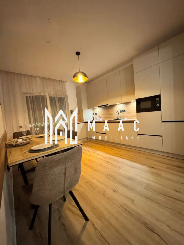 Apartament 2 camere | Terasa 39 MP | Modern | Selimbar - MAAC Imobiliare vă prezintă un apartament ideal atât pentru locuit, cât și pentru investiție în regim hotelier. 

Compartimentare:
Living spațios, amenajat într-un stil minimalist și elegant
Bucătărie cu zonă de dining 
Dormitor matrimonial
Baie modernă
Terasă premium cu jacuzzi privat
Acces separat către terasă prin grădină

Dotări și beneficii:
Încălzire în pardoseală
Finisaje si mobilier atent ales
Compartimentare practică și funcțională
Loc de parcare propriu inclus
Boxă de depozitare inclusă
Ideal pentru locuit sau investiție Airbnb/Booking.

Apartamentul se vinde exact ca în fotografii, complet mobilat și utilat, inclusiv jacuzzi, așternuturi, tacâmuri și toate elementele necesare pentru mutare imediată sau exploatare în regim hotelier.

Pentru mai multe detalii sau pentru programarea unei vizionări, vă rugăm să ne contactați și să menționați ID-ul proprietății: CP3086702
