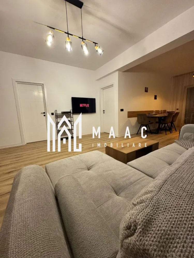 Apartament 2 camere | Terasa 39 MP | Modern | Selimbar - MAAC Imobiliare vă prezintă un apartament ideal atât pentru locuit, cât și pentru investiție în regim hotelier. 

Compartimentare:
Living spațios, amenajat într-un stil minimalist și elegant
Bucătărie cu zonă de dining 
Dormitor matrimonial
Baie modernă
Terasă premium cu jacuzzi privat
Acces separat către terasă prin grădină

Dotări și beneficii:
Încălzire în pardoseală
Finisaje si mobilier atent ales
Compartimentare practică și funcțională
Loc de parcare propriu inclus
Boxă de depozitare inclusă
Ideal pentru locuit sau investiție Airbnb/Booking.

Apartamentul se vinde exact ca în fotografii, complet mobilat și utilat, inclusiv jacuzzi, așternuturi, tacâmuri și toate elementele necesare pentru mutare imediată sau exploatare în regim hotelier.

Pentru mai multe detalii sau pentru programarea unei vizionări, vă rugăm să ne contactați și să menționați ID-ul proprietății: CP3086702
