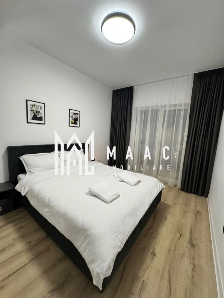 Apartament 2 camere | Terasa 39 MP | Modern | Selimbar - MAAC Imobiliare vă prezintă un apartament ideal atât pentru locuit, cât și pentru investiție în regim hotelier. 

Compartimentare:
Living spațios, amenajat într-un stil minimalist și elegant
Bucătărie cu zonă de dining 
Dormitor matrimonial
Baie modernă
Terasă premium cu jacuzzi privat
Acces separat către terasă prin grădină

Dotări și beneficii:
Încălzire în pardoseală
Finisaje si mobilier atent ales
Compartimentare practică și funcțională
Loc de parcare propriu inclus
Boxă de depozitare inclusă
Ideal pentru locuit sau investiție Airbnb/Booking.

Apartamentul se vinde exact ca în fotografii, complet mobilat și utilat, inclusiv jacuzzi, așternuturi, tacâmuri și toate elementele necesare pentru mutare imediată sau exploatare în regim hotelier.

Pentru mai multe detalii sau pentru programarea unei vizionări, vă rugăm să ne contactați și să menționați ID-ul proprietății: CP3086702
