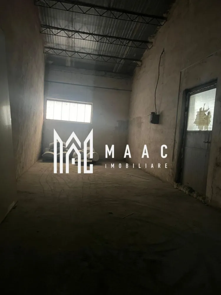 Hala | 380 MP | Teren 800 MP - MAAC Imobiliare vă propune spre închiriere o hală industrială/depozitare, situată în zona centrală a orașului, pe strada Morilor, cu acces facil pentru autovehicule de mare tonaj. Proprietatea are o suprafață totală de 380 mp, fiind compartimentată astfel: * spațiu de birouri – 30 mp * hală/depozit – 350 mp În completare, imobilul beneficiază de un teren de 800 mp, ce poate fi utilizat ca spațiu de depozitare exterioară, parcare sau zonă de manevră. Hala este racordată la toate utilitățile necesare desfășurării activităților comerciale sau industriale: * apă * curent trifazic * grup sanitar Datorită poziționării centrale, accesului facil și suprafețelor generoase, această proprietate este ideală pentru depozitare, logistică, producție ușoară sau activități comerciale. Preț de închiriere: 3 euro/mp + TVA Pentru mai multe informații sau programarea unei vizionări, vă invităm să contactați MAAC Imobiliare. id: CP2860090 - SP }}