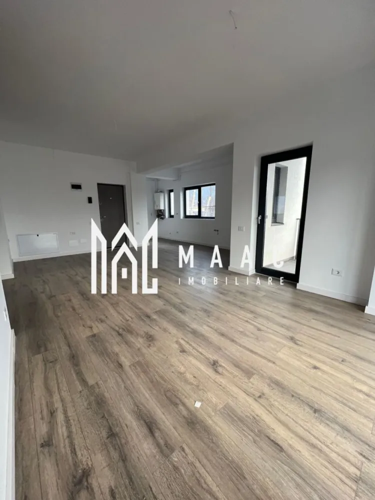 Apartament 3 camere | Bloc Nou | Central - MAAC Imobiliare vă propune spre vânzare un apartament modern cu 3 camere, având o suprafață totală de 84 mp, situat în zona centrală a orașului, în imediata apropiere a bazei sportive Oltchim, într-o zonă nouă, aflată în plină expansiune rezidențială. Apartamentul este amplasat la etajul 1 al unui bloc nou, cu doar 6 apartamente, oferind intimitate și un confort sporit. Un avantaj important îl reprezintă locul de parcare subteran, inclus în proprietate. Compartimentarea este modernă și eficientă, fiind realizată astfel: * living cu bucătărie open-space * 2 dormitoare * 2 grupuri sanitare * hol * 2 balcoane Imobilul beneficiaza de incalzire prin pardoseala. Datorită poziționării excelente, a blocului nou și a compartimentării funcționale, acest apartament este ideal atât pentru locuit, cât și ca investiție. Pentru mai multe informații sau pentru programarea unei vizionări, vă invităm să contactați MAAC Imobiliare. id: CP2860084 - SP }}