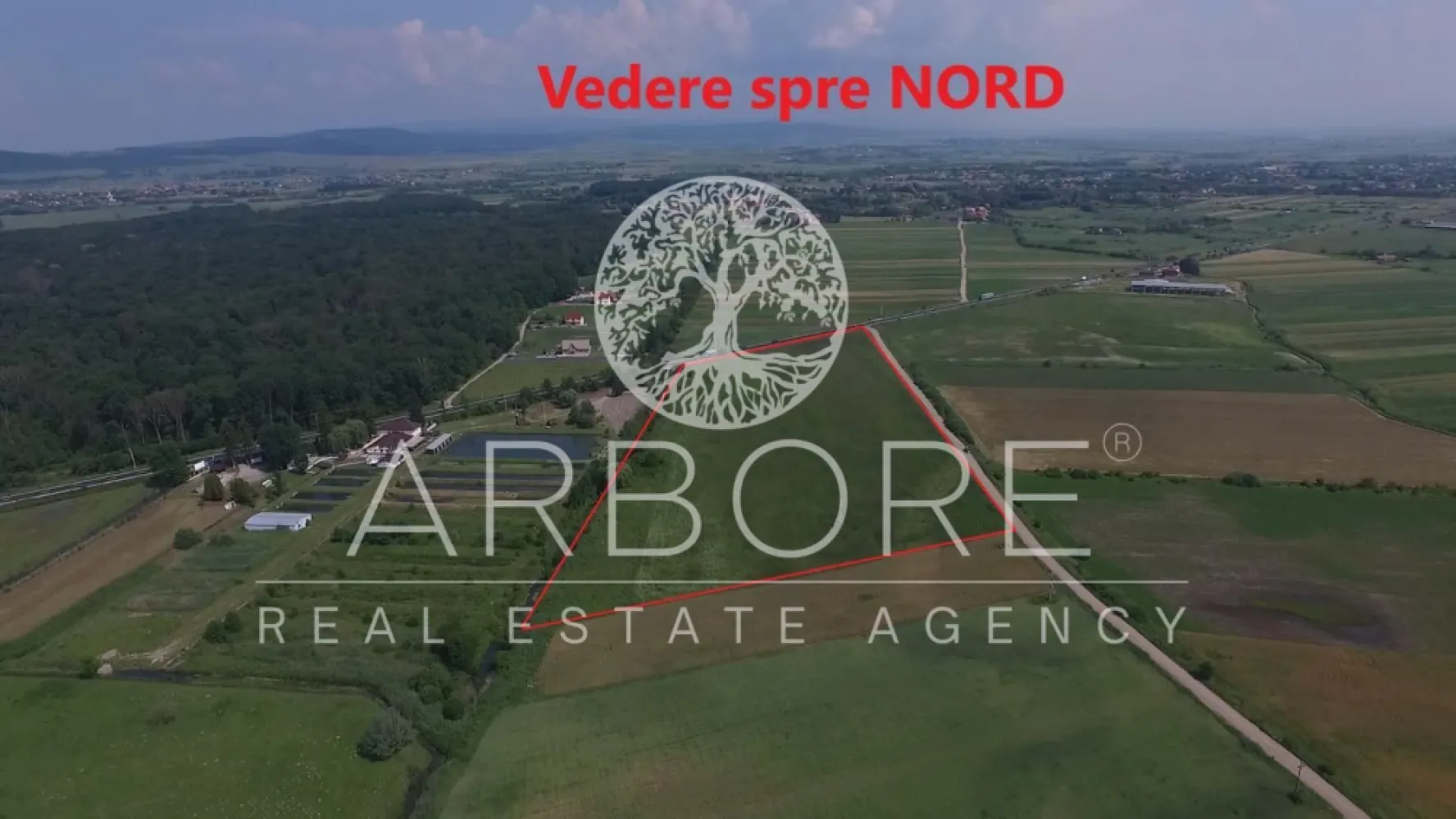 Teren Industrial 45.000 mp | PUZ Aprobat | DN11 Prejmer Brașov - Teren intravilan cu destinație prestări servicii, birouri și mică industrie, situat în satul Lunca Calnicului, comuna Prejmer, județul Brașov, cu front direct la DN11 (Brașov–Sfântu Gheorghe).
Caracteristici principale:
Suprafață totală 45.000 mp, clasificare intravilan, PUZ aprobat prin Hotărârea Consiliului Local Prejmer nr. 100/16.07.2025. Acces carosabil asigurat din DN11 și drumul de exploatare DE 1053, oferind două fronturi de acces independente — ideal pentru fluxuri separate de marfă și personal.
Indicatori urbanistici:

POT maxim 35% — suprafață construită la sol 15.750 mp
CUT maxim 0,6 — suprafață desfășurată totală 27.000 mp
Regim înălțime S+P+1+M, maxim 12m la coamă
Retrageri: 10m față de limita est, 12m față de limita sud

Oportunitate de investiție:
Teren perfect pentru dezvoltarea unui parc industrial, hale de producție sau depozitare, clădiri de birouri sau spații comerciale. Zona Prejmer este unul dintre cele mai dinamice centre industriale din județul Brașov, cu numeroase companii internaționale active în zonă.
Localizare strategică:

15 km față de municipiul Brașov
Front DN11 — trafic intens, vizibilitate maximă
Acces facil A3 și rețeaua feroviară Brașov
Vecinătate parc industrial Prejmer

Utilitățile sunt disponibile în zonă. Teren fără sarcini sau litigii. PUZ aprobat, disponibil imediat.

______________________________________________________________________________________________________________

Intravilan land designated for services, offices and light industry, located in Lunca Calnicului village, Prejmer commune, Brașov County, with direct frontage on DN11 national road (Brașov–Sfântu Gheorghe).
Key features:
Total area 45,000 sqm, intravilan classification, PUZ approved by Prejmer Local Council Decision no. 100/16.07.2025. Road access via DN11 and public road DE 1053, providing two independent access points — ideal for separate freight and personnel flows.
Urban planning indicators:

Max POT 35% — 15,750 sqm ground floor buildable area
Max CUT 0.6 — 27,000 sqm total floor area
Height regime S+P+1+M, max 12m ridge height
Setbacks: 10m from east boundary, 12m from south boundary

Investment opportunity:
Ideal for industrial park development, production or storage facilities, office buildings or commercial spaces. The Prejmer area is one of the most dynamic industrial zones in Brașov County, home to numerous international companies.
Strategic location:

15 km from Brașov city centre
DN11 frontage — high traffic, maximum visibility
Easy access to A3 motorway and Brașov railway network
Adjacent to Prejmer industrial park

Utilities available in the area. No encumbrances or litigation. PUZ approved, immediately available.