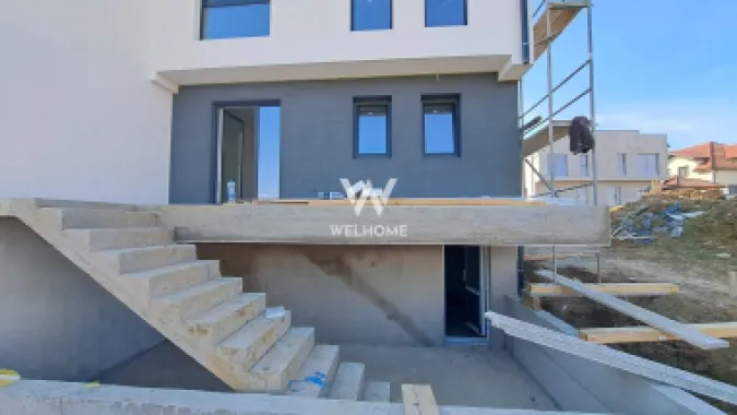 Logo Welhome Imobiliare logo