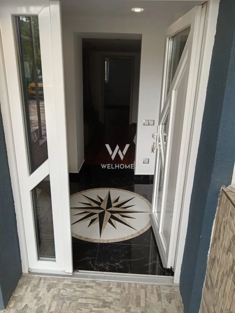 Casă individuală cu 2 apartamente separate, teren 650 mp, garaj și terasă