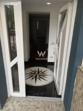 Casă individuală cu 2 apartamente separate, teren 650 mp, garaj și terasă