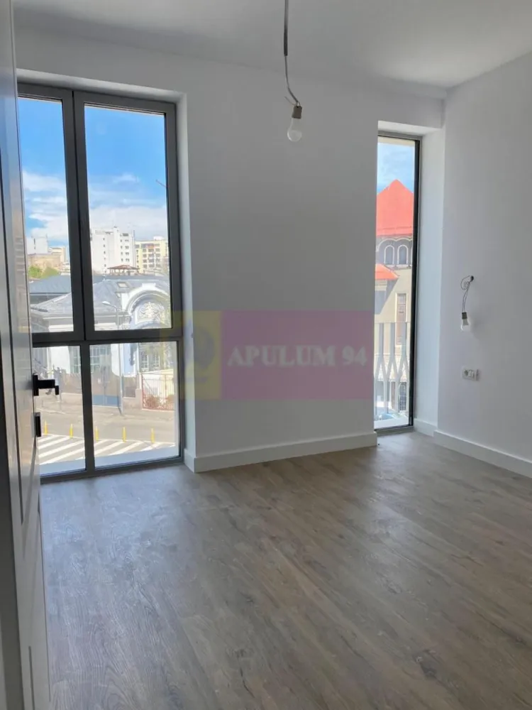 Apartament 3 camere 85mp | OFERTA SPECIALA - Arhitectura proiectului boutique Licurg 2 Prime Residence încorporează elemente de design specifice zonei, evidențiindu-se prin fațade elegante și detalii de piatră atent lucrate, ce se integrează armonios în peisajul local. Materialele, culorile și texturile sunt alese pentru a menține un aspect estetic în armonie cu stilul arhitectural tradițional al zonei.

Proiectul include o selecție diversă de apartamente cu 3 și 4 camere , caracterizate prin ferestre ample, camere luminoase si o locatie speciala.

NOTA: Apartamentul se poate inchiria la pretul de 1650 euro + TVA lunar. ( OFERTA SPECIALA - timp limitat ).
Contract minim 1 an. Loc parcare subteran 150 euro + TVA/ lunar.
Detalii Apartament ( ref ap 11)
3 camere
Decomandat
85mp utili
Terasa 5 mp
Etaj 2/3

CONTACT
apulum94@apulum94.ro
adrian@apulum94.ro
Whatsapp +40733683453

The architecture of Licurg 2 Prime Residence boutique project incorporates design elements specific to the area, featuring elegant facades and meticulously crafted stone details that harmonize with the local landscape. The materials, colors, and textures are chosen to maintain an aesthetic consistent with the traditional architectural style of the area.

The project includes a diverse selection of 3 and 4-room apartments, characterized by large windows that allow natural light to flood the spacious, well-organized interiors.
Price per parking space is 32.000 euro + VAT. There are 2 parking spaces for each apartment, in the underground parking space.
Apartment Details:

3 rooms
Detached layout
85 sqm usable area
5 sqm terrace
Floor 2/3
Contact:

Email: apulum94@apulum94.ro, adrian@apulum94.ro
WhatsApp: +40733683453

EXTERIOR:

Rame din aluminiu:

Barieră termică ALIPLAST, culoare bej RAL 7044
Fixare mecanică pe cadru de oțel 30 x 30 mm
Geamuri triple:

Compoziție generală: Sticlă 6 mm 4S, distanțier 16 mm WE, sticlă float 4 mm, sticlă low E 6 mm
Parter spre stradă: Sticlă temperată KN 166 ESG 6 mm, distanțier 16 mm WE, sticlă float 4 mm, sticlă laminată low E 4.4.1 mm
Valoare U totală: 1,05 pentru rame și ferestre din aluminiu
PEISAGISTICĂ:

Design exterior:

Alee de intrare cu plăci ceramice
Drum de acces la subsol asfaltat
Mobilier urban pe platforme de beton, cu zone de flori integrate
Spații verzi:

Pe plăci de beton: Ghivece de plante (adâncime 50-70 cm), arbuști și gazon la rampa de intrare
Pe sol natural: Plantații de arbori și arbuști, gazon, pentru uz exclusiv apartamentelor 1 și 2
INTERIOR:

Pereți cu vopsea multistrat:

Trei straturi de vopsea albă lavabilă pe plăci de gips tencuite
Bază din bloc ceramic de 30 cm grosime
Pardoseli ceramice și laminat:

Plăci ceramice antiderapante și lemn laminat pe șapă de ciment
Izolație și calitate a construcției:

Izolație din lână minerală între cărămizi și plăci de gips pentru eficiență termică
Proiectare orientată spre confort și economie de energie