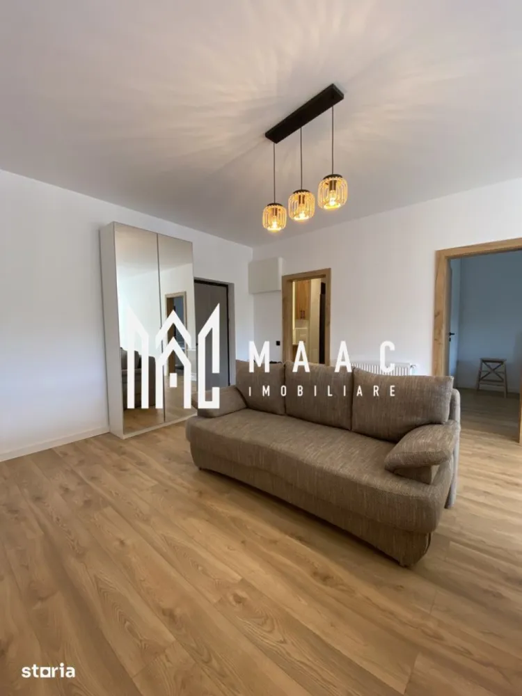 Apartament 2 camere | 54 MPU | Calea Turnisorului (PET FRIENDLY) - MAAC Imobiliare vă propune spre închiriere un apartament modern, luminos și bine compartimentat, situat în zona Neppendorf din Sibiu, într-un imobil prevăzut cu lift și acces facil către principalele puncte de interes ale orașului. Proprietatea este ideală pentru un cuplu sau pentru o persoană activă care își dorește confort, funcționalitate și conexiuni rapide atât către centrul orașului, cât și către autostradă.

Apartamentul are o suprafață utilă de 54 mp, la care se adaugă un balcon cu acces din living, oferind un spațiu confortabil și eficient organizat. Locuința beneficiază de finisaje moderne, încălzire în pardoseală și clasă energetică A, ceea ce asigură un consum redus și un nivel ridicat de confort pe tot parcursul anului.

Compartimentarea este realizată astfel:
-living generos open space cu bucătărie
-dormitor confortabil
-baie spațioasă
-hol de intrare
-balcon cu acces din living

Dotări și avantaje:
-apartament complet mobilat și utilat
-mașină de spălat rufe
-mașină de spălat vase
-frigider
-cuptor electric
-plită electrică
-televizor
-Wi-Fi
-PET FRIENDLY – pisică
-încălzire în pardoseală
-clasă energetică A
-loc de parcare inclus
-imobil dotat cu lift
-zonă liniștită și accesibilă
-acces facil către centrul orașului și autostradă

Condiții de închiriere:
-garanție: echivalentul unei chirii lunare
-disponibilitate: 1 iunie

Pentru mai multe detalii sau pentru programarea unei vizionări, vă rugăm să ne contactați specificând CP3094225.