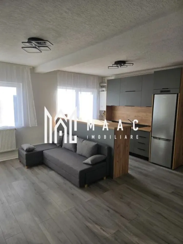 Apartament 3 camere | 2 Bai | Zona Strand - MAAC Imobiliare vă propune spre închiriere un apartament modern cu 3 camere, situat într-o zonă liniștită iar in apropiere sunt principalele puncte de interes ale orașului.

Locuința dispune de o suprafață utilă de 70 mp și este compartimentată eficient, oferind confort și funcționalitate: living spațios și luminos, două dormitoare, bucătărie complet utilată, două băi și spații generoase de depozitare.

Apartamentul este amenajat cu mobilier de calitate și beneficiază de un ambient primitor, ideal pentru o familie, un cuplu sau persoane care își doresc un spațiu elegant și practic.

Printre avantajele proprietății se numără:
• suprafață generoasă de 70 mp utili
• 3 camere decomandate
• 2 băi
• bucătărie complet mobilată și utilată
• zonă accesibilă, aproape de magazine, școli, mijloace de transport și alte puncte de interes

Pentru mai multe detalii sau pentru programarea unei vizionări, echipa MAAC Imobiliare vă stă la dispoziție.

Pentru informații suplimentare, menționează codul ID: CP3096517