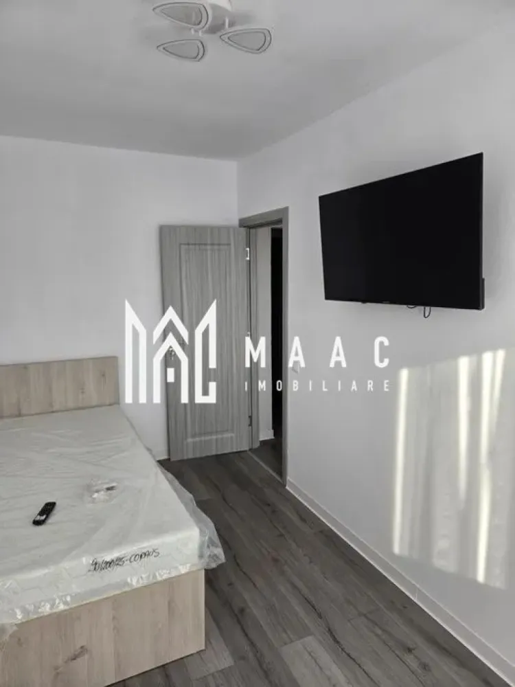 Apartament 3 camere | 2 Bai | Zona Strand - MAAC Imobiliare vă propune spre închiriere un apartament modern cu 3 camere, situat într-o zonă liniștită iar in apropiere sunt principalele puncte de interes ale orașului.

Locuința dispune de o suprafață utilă de 70 mp și este compartimentată eficient, oferind confort și funcționalitate: living spațios și luminos, două dormitoare, bucătărie complet utilată, două băi și spații generoase de depozitare.

Apartamentul este amenajat cu mobilier de calitate și beneficiază de un ambient primitor, ideal pentru o familie, un cuplu sau persoane care își doresc un spațiu elegant și practic.

Printre avantajele proprietății se numără:
• suprafață generoasă de 70 mp utili
• 3 camere decomandate
• 2 băi
• bucătărie complet mobilată și utilată
• zonă accesibilă, aproape de magazine, școli, mijloace de transport și alte puncte de interes

Pentru mai multe detalii sau pentru programarea unei vizionări, echipa MAAC Imobiliare vă stă la dispoziție.

Pentru informații suplimentare, menționează codul ID: CP3096517
