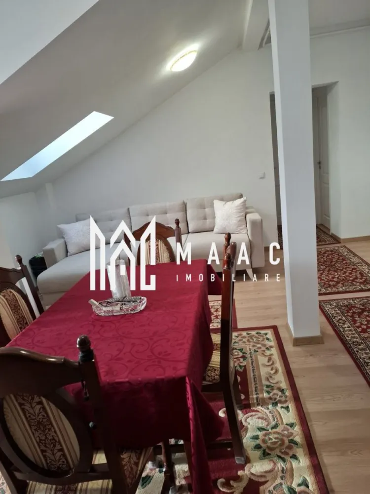 Apartament modern 3 camere de vânzare | 68 mp | Parcare inclusă - MAAC Imobiliare vă propune spre vânzare un apartament modern cu 3 camere, decomandat, situat la etajul 2 din 2 al unui imobil construit în anul 2021.

Apartamentul are o suprafață utilă de 68 mp și se vinde complet mobilat și utilat, exact cum se prezintă în fotografii, fiind pregătit pentru mutare imediată.

Compartimentarea este practică și bine gândită:

2 dormitoare
living generos
bucătărie separată (inițial open-space, ulterior închisă)
baie
fostul grup sanitar de serviciu transformat în cămară/depozitare, cu instalațiile păstrate intacte

Dotări și beneficii:

încălzire în pardoseală
centrală termică Bosch
aer condiționat
loc de parcare inclus
ferestre Velux în baie și bucătărie, cu deschidere electrică prin telecomandă
senzori de ploaie pentru închiderea automată a ferestrelor
apartament luminos și eficient compartimentat

Imobilul este ideal atât pentru locuit, cât și pentru investiție, fiind situat într-o zonă liniștită și în continuă dezvoltare.

Pentru mai multe detalii precizati telefonic ca ati vazut anuntul cu ID: CP3097318