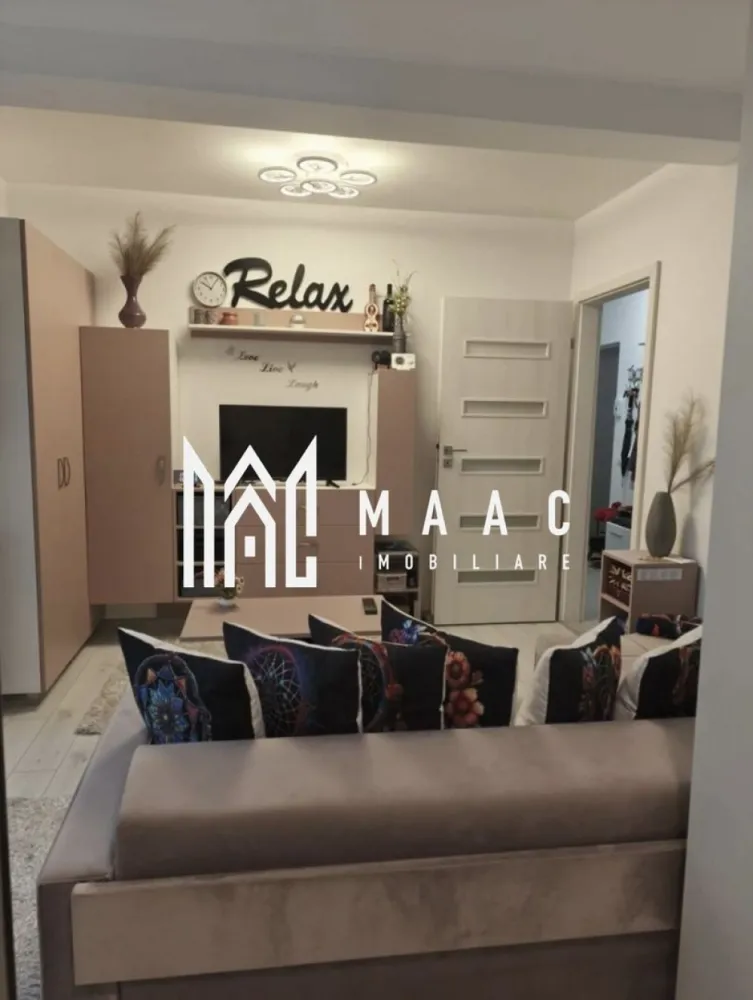 Apartament 2 Camere | Curte | Doamna Stanca - MAAC Imobiliare oferă spre vânzare un apartament cu orientare sud-vestică, având o suprafață utilă de 52 mp, construit în 2021, încadrat în clasa energetică A. Proprietatea beneficiază de balcon, debară, loc de parcare și o curte privată de 45 mp, ideală pentru relaxare sau activități în aer liber. Compartimentare și avantaje: • Bucătărie separată, complet mobilată și utilată cu toate electrocasnicele necesare unei gospodării moderne • Living cu acces direct către balcon și curte • Ieșire în balcon și curte atât din bucătărie, cât și din living • Baie spațioasă, dotată cu geam • Centrală termică proprie • Încălzire în pardoseală Pentru mai multe detalii sau pentru programarea unei vizionări, vă rugăm să ne contactați, menționați ID-ul anunțului: CP2863559. }}