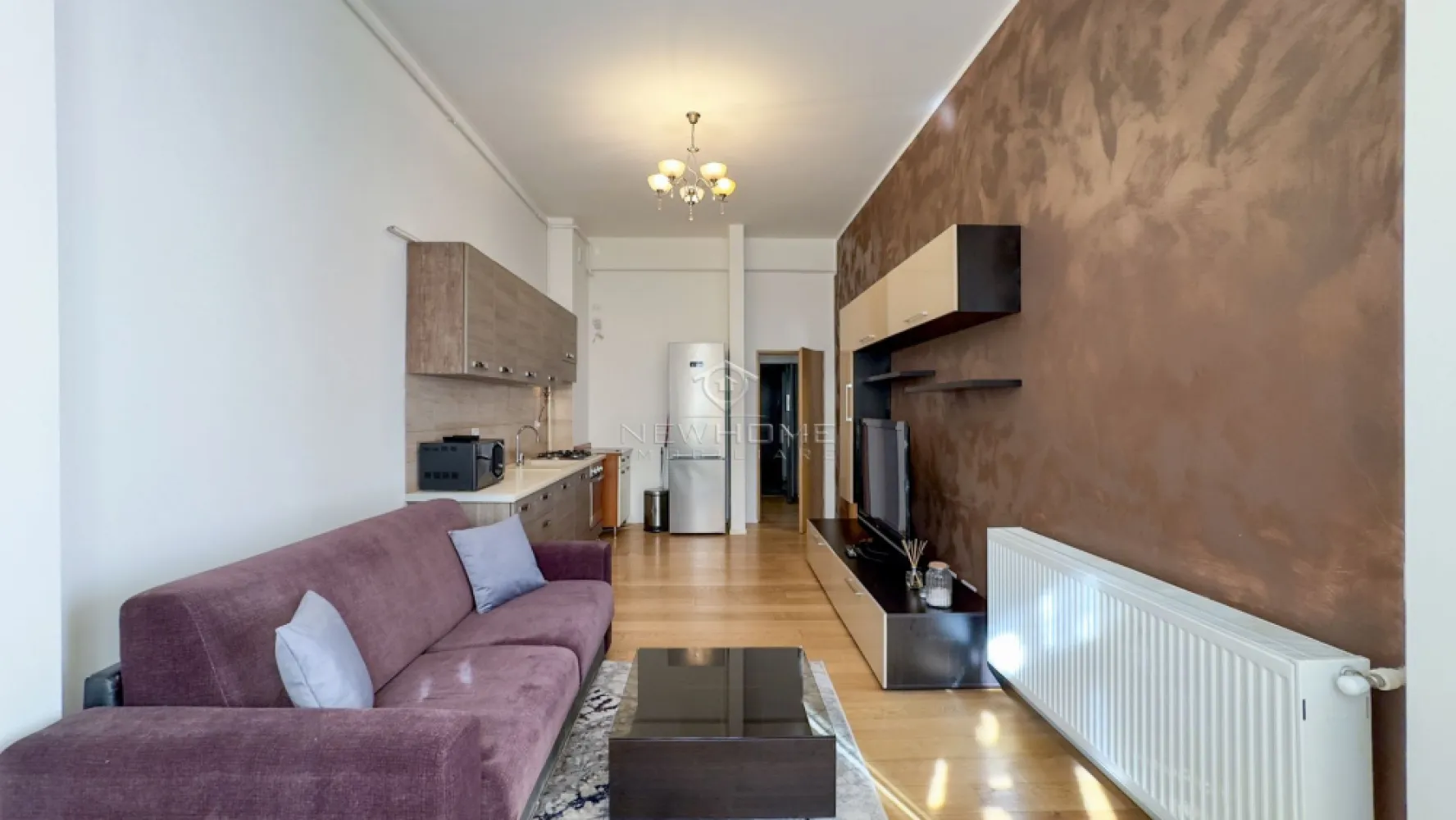Apartament 2 camere, 55mp, zona Centru Str Traian - NewHome Imobiliare ofera in EXCLUSIVITATE spre inchiriere un apartament modern cu 2 camere semidecomandate, dispune de suprafata utila de 55 mp + 5 mp balcon. Situat la parterulunui unui imobil NOU cu 5 etaje (complexul Traian Residence) construit in anul 2018. Apartamentul este compus din: hol, living open-space impreuna cu bucataria, dormitor, balcon, baie. Pentru confortul Dvs. apartamentul se inchiriaza complet mobilat si utilat, dotat cu, centrala termica propri. Avand in vedere poziția si avantajele zonei este una de mare interes, in apropiere ceentru, mijloace de transport, magazine, farmacii, bănci, etc. Pentru mai multe informatii sau pentru a programa o vizionare contactați-ne cu încredere.