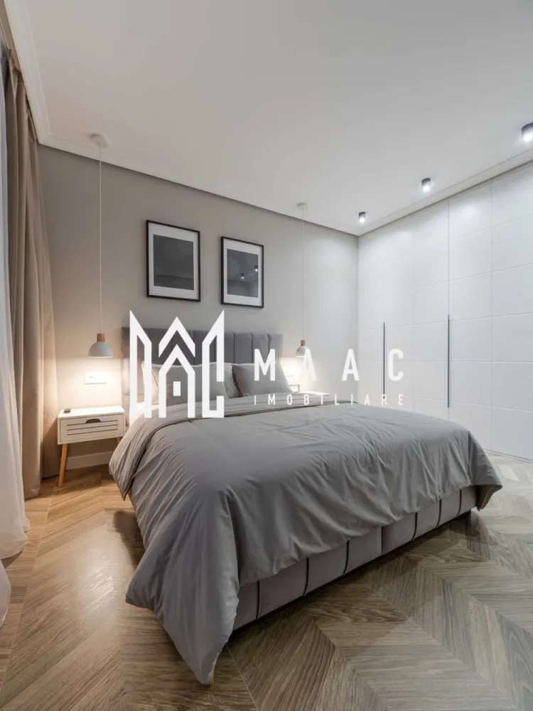 Apartament 2 Camere | Regim Hotelier Activ | Cartierul Arhitecților - MAAC Imobiliare vă propune spre vânzare un apartament modern și elegant, ideal atât pentru locuit, cât și pentru investiție. Proprietatea funcționează în prezent în regim hotelier, fiind complet operațională, cu clasificare emisă de Ministerul Turismului, recenzii excelente și posibilitate de preluare imediată a afacerii.

Caracteristici principale

• suprafață utilă de 52,7 mp
• living open-space luminos și spațios
• dormitor generos
• baie modernă cu baterii încastrate și sistem rain shower
• loc de parcare privat inclus

Compartimentare și dotări

• mobilier premium realizat din MDF vopsit
• bucătărie complet echipată și utilată
• electrocasnice noi, încorporate
• dulapuri încăpătoare realizate la comandă
• încălzire în pardoseală
• centrală termică Viessmann
• uși premium Porta Doors
• ferestre termopan
• finisaje premium inclusiv în casa scării, cu granit și balustradă din sticlă

Localizare și avantaje

• situat în Cartierul Arhitecților, zona Lidl
• acces facil către magazine și puncte de interes
• stație pentru transport public chiar în fața imobilului
• zonă în continuă dezvoltare și foarte căutată

Beneficii

• afacere profitabilă în regim hotelier inclusă
• venituri constante și posibilitate de preluare imediată
• ideal pentru investiție sau locuință personală
• apartament complet mobilat și utilat premium
• gata de exploatare fără investiții suplimentare

Această proprietate reprezintă o oportunitate excelentă pentru cei care își doresc un apartament modern, cu finisaje premium și un business deja funcțional, într-una dintre cele mai apreciate zone rezidențiale.

 Pentru mai multe detalii și programarea unei vizionări, vă rugăm să ne contactați și să menționați ID-ul proprietății: CP3093822.