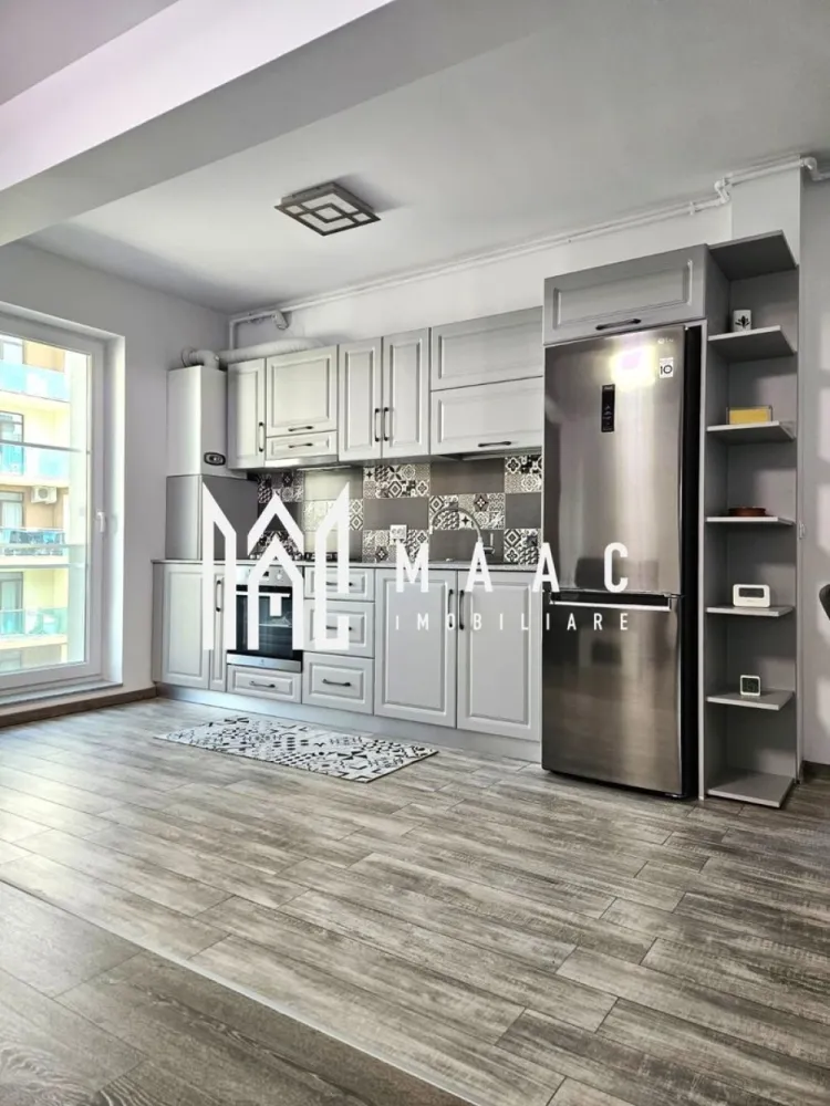Apartament 2 camere | 50 mp utili + Balcon 10mp | Doamna Stanca - Maac Imobiliare prezintă un apartament modern cu 2 camere, situat pe strada Doamna Stanca, în imediata apropiere de Kaufland și Shopping City. Detalii proprietate: Suprafață utilă: 50 mp Balcon spațios: 10 mp Etaj: 4/6, bloc cu lift Loc de parcare privat inclus Finisaje și dotări: Apartament complet refăcut după predarea de la dezvoltator Sapa autonivelantă înainte de montajul gresiei și parchetului (delimitare ingenioasă între bucătărie și living, în dreptul grinzii) Glafuri din granit Prize și întrerupătoare Schneider Corpuri de iluminat Eglo Uși Porta Doors Elemente sanitare de la Grohe și Ravak Mobilier și electrocasnice: Apartament complet mobilat și utilat Mobilier realizat pe comandă din MDF Electrocasnice noi, neutilizate Avantaje: Apartamentul nu a fost locuit până în prezent Proiectat și finisat cu materiale premium, pentru uz propriu, nu pentru vânzare Poziționare excelentă, aproape de centre comerciale și mijloace de transport Pentru mai multe detalii sau pentru a programa o vizionare contactează - ne specificând ID: CP2869933 }}