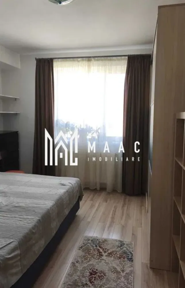 Apartament 2 camere | Loc de parcare | Calea Dumbrăvii - MAAC Imobiliare vă propune spre închiriere un apartament modern cu 2 camere, situat într-o zonă foarte apreciată din Sibiu – Calea Dumbrăvii, la intersecția cu Strada Siretului, la doar câteva minute de Parcul Sub Arini.

Poziționat într-un cartier liniștit, construit în 2008, imobilul beneficiază de o zonă de acces și o casă a scării spațioase și foarte bine întreținute.

Apartamentul are o suprafață utilă de 54 mp și oferă o compartimentare practică, fiind complet mobilat și utilat.

Compartimentare: living luminos cu bucătărie open-space, dormitor, baie generoasă, hol, debara -utilă pentru depozitare.

Oferta include un loc de parcare privat, un avantaj important în zonă.

Se percepe garantie in cuantumul unei chirii lunare. 

Accesul la transportul în comun este excelent, iar Parcul Sub Arini la doar 500 m.

Pentru mai multe detalii precizati telefonic ca ati vazut anuntul cu ID: CP2822879
