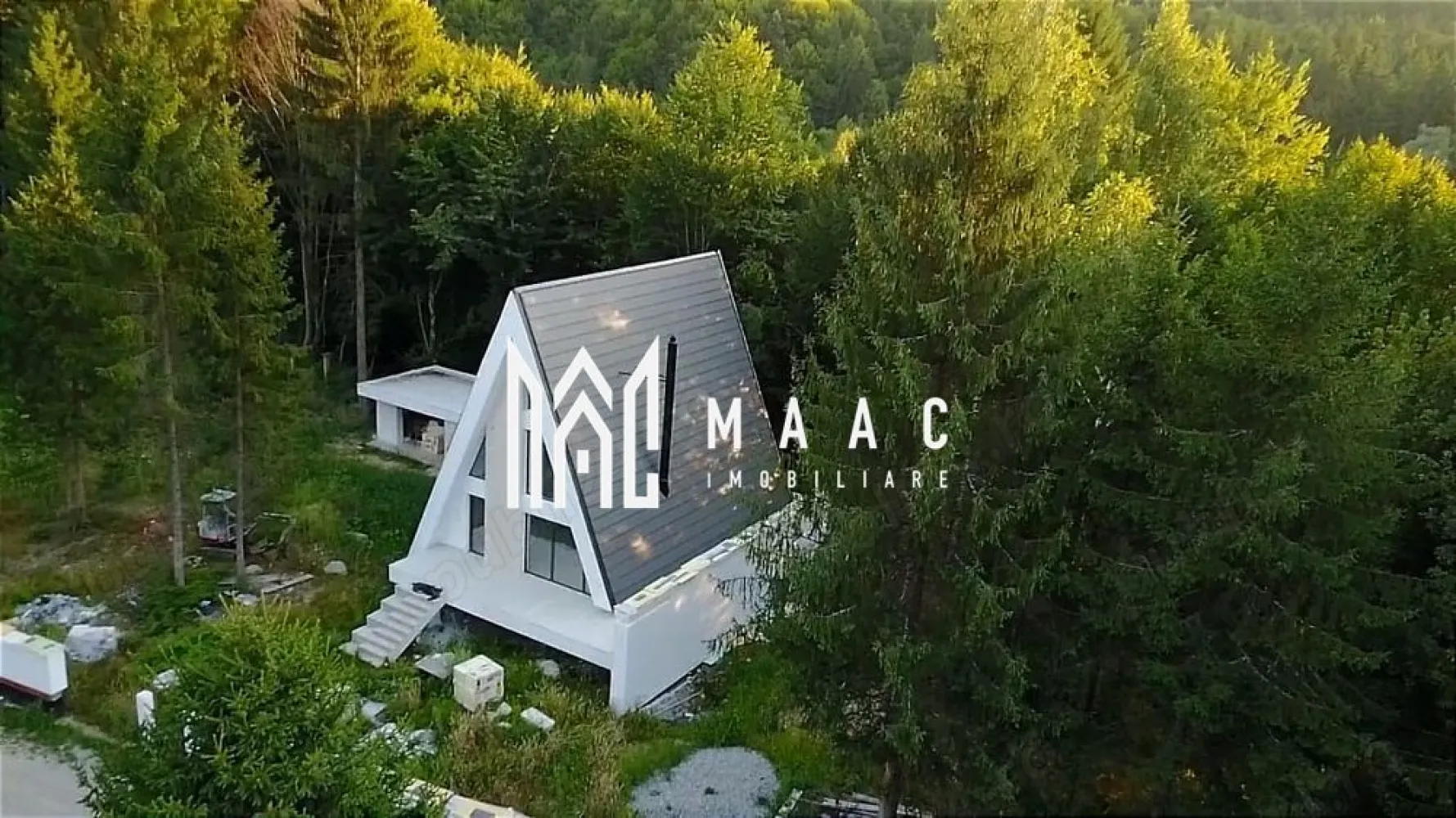 Cabană tip A frame | 3 camere | Zona Turistică Porumbacu de Sus - MAAC Imobiliare va oferă spre vanzare o cabana de lux în Zona Turistică Porumbacu de Sus

Descriere Generală:

Localizare: Porumbacu de Sus, aproape de Castelul de Lut și Povestea Calendarului, la 40 km de Sibiu
Suprafață cabană: 153 mp
Suprafață teren: 1000 mp teren intravilan
Etaje: 2
Dormitoare: 3
Băi: 2
Living: Spațios, 62 mp
Design: Deosebit, utilizând materiale exclusiv premium

Caracteristici și Dotări:
Încălzire: În pardoseală
Acoperiș: Țiglă ceramică premium Tondach Inspira
Tâmplărie: Aluminiu Alumil
Scară interioară: Elicoidală

Șemineu: Premium
Construcție: Suspendată pe piloni/stâlpi de ciment
Terasa: Suspendată la 4m cu priveliște către pădure
Înălțimea de la sol a cabanei: 11 m
Facilități Adiționale:
Filigorie: Se poate transforma în tiny house

Preț:
Stadiul actual: [preț inițial]
La cheie: 272.000 euro, negociabil
Avantaje:
Materiale Premium: Sto Werk, design și finisaje de înaltă calitate
Locație: Aproape de atracții turistice importante, zonă pitorească și liniștită
Priveliște: Superbă, cu terasa suspendată în fața pădurii
Flexibilitate: Opțiune de personalizare la cheie

Pentru mai multe informații sau pentru a programa o vizionare, nu ezitați să ne contactați, specificand ID: CP2088413
