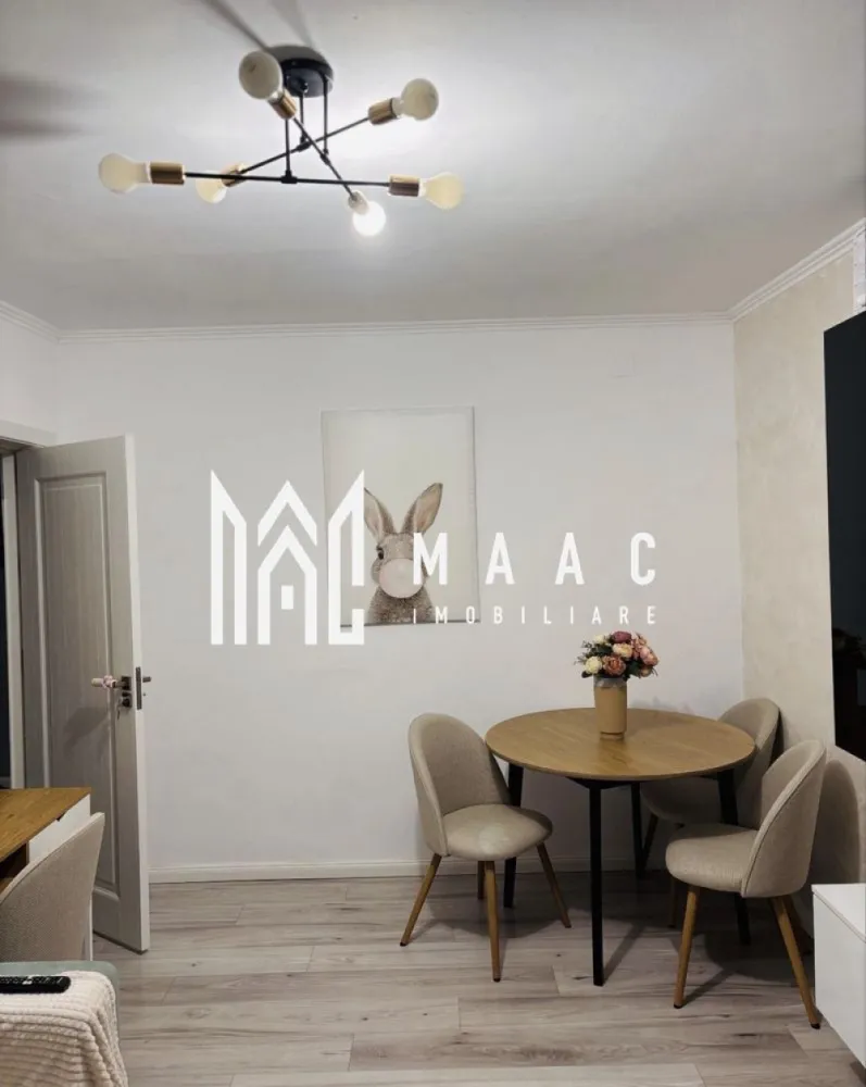 Apartament 3 camere | Ostroveni | Etaj 2 | 94 mpu | - MAAC Imobiliare vă propune spre vânzare un apartament spațios și modern, situat pe Bulevardul Tineretului, în zona S2 din Râmnicu Vâlcea, una dintre cele mai apreciate zone rezidențiale ale orașului. Proprietatea este amplasată la etajul 2 din 10 și oferă un echilibru perfect între confort, funcționalitate și poziționare excelentă.
Cu o suprafață utilă generoasă de 94 mp, apartamentul este ideal pentru o familie care își dorește spațiu, lumină naturală și acces rapid către toate facilitățile importante ale orașului. Se vinde complet mobilat și utilat, fiind pregătit pentru mutare imediată. Liftul din bloc a fost schimbat recent.Instalatia electrica si sanitara a fost schimbata total.
Apartament cu 4 camere
Suprafață utilă de 94 mp
Etaj 2 din 10
Situat pe Bulevardul Tineretului – zona S2
Complet mobilat și utilat
Ideal pentru locuit sau investiție
Compartimentare practică și luminoasă
Compartimentare:
Living generos și luminos
3 dormitoare spațioase
Bucătărie complet mobilată și utilată
2 băi
2 balcoane
Hol bine organizat
Dotări:
Mobilier complet
Electrocasnice incluse
Finisaje moderne
Spații generoase și bine iluminate natural
Compartimentare eficientă
Apartament pregătit pentru mutare imediată
Avantaje:
Poziționare excelentă într-o zonă apreciată
Acces rapid către magazine, școli și grădinițe
Ideal pentru familie
Etaj intermediar
Spațiu generos și confort ridicat
Potrivit și pentru investiție
Pentru mai multe informații și programarea unei vizionări:
Echipa MAAC Imobiliare vă stă la dispoziție. ID 3107833