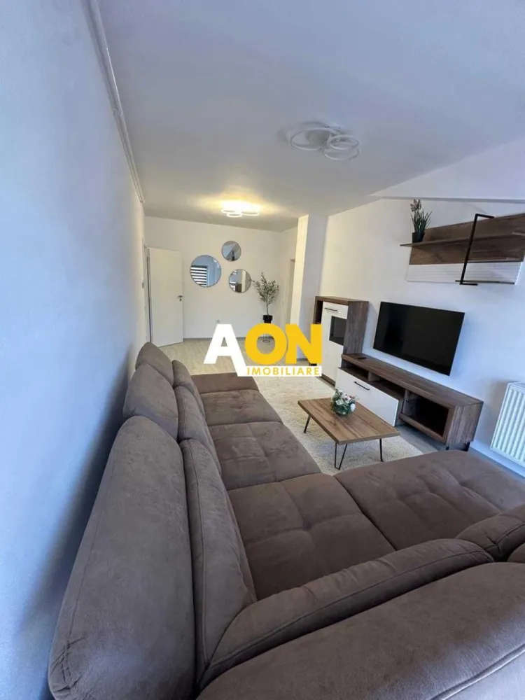 Apartament decomandat 3 camere de închiriat | 80 mp | Bloc cu lift - Aon Imobiliare vă prezintă spre închiriere un apartament decomandat cu 3 camere, având o suprafață utilă de 80 mp, situat la etajul 4 într-un imobil dotat cu lift, ideal pentru cei care își doresc confort și spațiu generos.
Apartamentul este complet mobilat și utilat, fiind pregătit pentru mutare și oferind toate dotările necesare unui stil de viață confortabil.
Compartimentare:
• living
• 2 dormitoare
• bucătărie
• baie
• hol
• spații generoase de depozitare

Dotări și beneficii:
• aer condiționat
• televizor
• bucătărie complet echipată
• mașină de spălat
• internet/Wi-Fi
• bloc cu lift
• compartimentare decomandată
• suprafață generoasă – 80 mp

Apartamentul oferă un ambient plăcut și funcțional, fiind potrivit atât pentru o familie, cât și pentru persoane care caută un spațiu modern și bine organizat.

Disponibil după data de 15 iunie.
Pentru mai multe detalii sau programarea unei vizionări, vă stăm la dispoziție.CP3107603