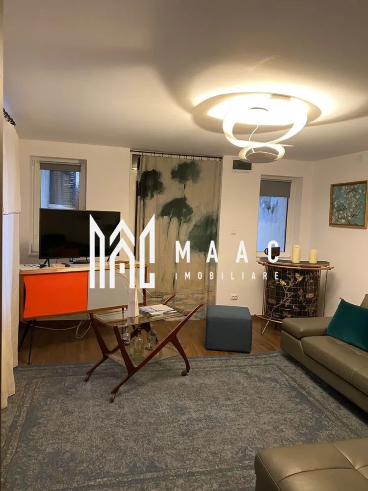 Casă | 80 MPU | Curte | Sub Arini - MAAC Imobiliare vă propune spre închiriere o casă cu 2 camere, situată într-o zonă premium și deosebit de căutată din Sibiu, în imediata apropiere a parcului Sub Arini. 

Poziționarea oferă un echilibru perfect între liniștea naturii și accesibilitatea rapidă către punctele de interes ale orașului.

Proprietatea este dispusă pe un singur nivel, fiind o construcție solidă din caramidă, realizată în anul 1985 și complet pregătită pentru a deveni noua dumneavoastră locuință. 

Casa are un acoperiș oblic din țiglă si beneficiază de o curte individuala împrejmuită, ideala pentru relaxare.

Caracteristicile principale ale proprietății sunt următoarele:

Casă pe un singur nivel (construcție din cărămidă, an 1985)

 2 camere:
dormitor 

bucătărie închisă

baie cu cabină de duș

Suprafață teren: 250 mp (curte individuală împrejmuită)

Sistem de încălzire: Centrala proprie pe gaz

Utilități complete: Apa curentă, electricitate, canalizare, țeavă de gaz, internet, cablu TV, telefon

Tamplărie si finisaje: Tâmplărie termopan

Elemente de siguranță: Obloane și ușă metalică la intrare

Dacă aceasta proprietate corespunde cerințelor dumneavoastră și doriti să locuiți într-una dintre cele mai verzi zone din oraș, nu ezitați să ne contactați pentru a programa o vizionare sau pentru a obține informații suplimentare specificând codul de identificare al proprietății ID: CP3111952.