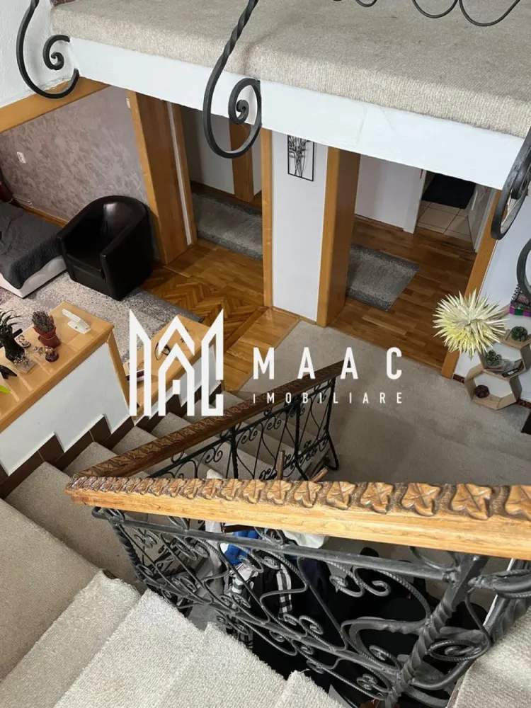CASA VANZARE | ULTRACENTRAL | TEREN 600 MP - MAAC Imobiliare vă propune spre vânzare o vilă renovată, cu suprafața de 202 mp și teren generos de 600 mp, ideală pentru cei care caută o proprietate spațioasă, solidă și bine compartimentată. Construcția a fost finalizată în anul 1970 și oferă un echilibru între suprafața utilă, curtea amplă și dotările existente.

Vila dispune de 5 camere, 3 toalete, 2 holuri, 1 bucătărie, scară interioară și 1 terasă la etaj. Proprietatea include tâmplărie tripan marca Salamander wenge 100 mm, parchet din stejar și beci de 16 mp, elemente care contribuie la confortul locuinței.

Terenul de 600 mp este organizat eficient, cu 200 mp de pavele, 102 mp amprentă la sol a casei, 1 garaj deschis și 1 foișor, oferind spațiu util atât pentru locuire, cât și pentru relaxare în aer liber.

Pentru vizionare, vă rugăm să menționați la telefon CP3052530.