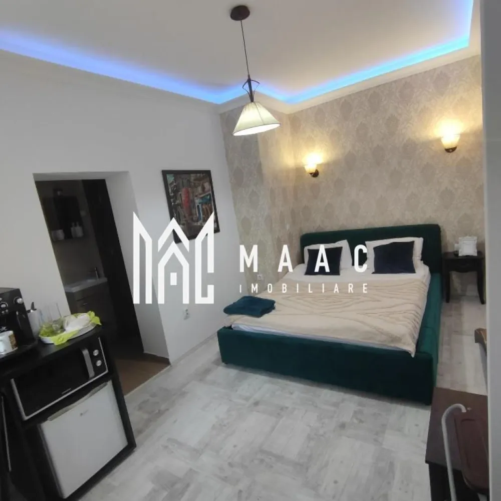 2 garsoniere | Ocazie investitie | Ultracentral - MAAC Imobiliare vă propune spre vânzare un spațiu situat ultracentral, într-o zonă cu trafic intens și vizibilitate foarte bună.

Proprietatea este utilizată în prezent în regim hotelier, însă datorită poziționării și compartimentării sale, poate fi folosită și ca spațiu comercial, birouri, cabinet, salon sau pentru alte activități.

Imobilul este înscris în CF ca apartament și este compartimentat în două garsoniere separate, fiecare cu intrare individuală – una la parter și una la etaj.

Spațiile sunt renovate complet și beneficiază de schimbare de destinație realizată la primărie.

Suprafața utilă este de 37 mp, la care se adaugă boxă la beci și boxă în pod.

Se vinde complet mobilat și utilat, exact ca în fotografii, fiind pregătit pentru utilizare imediată sau investiție.

Avantaje:

- locație ultracentrală
- potrivit pentru investiție
- ideal pentru regim hotelier, birouri sau activitate comercială
- două spații separate
- intrări individuale
- renovat complet
- boxă beci + boxă pod
- disponibil imediat

Pentru mai multe detalii sau programarea unei vizionări, nu ezitați să ne contactați specificand ID: CP3117958