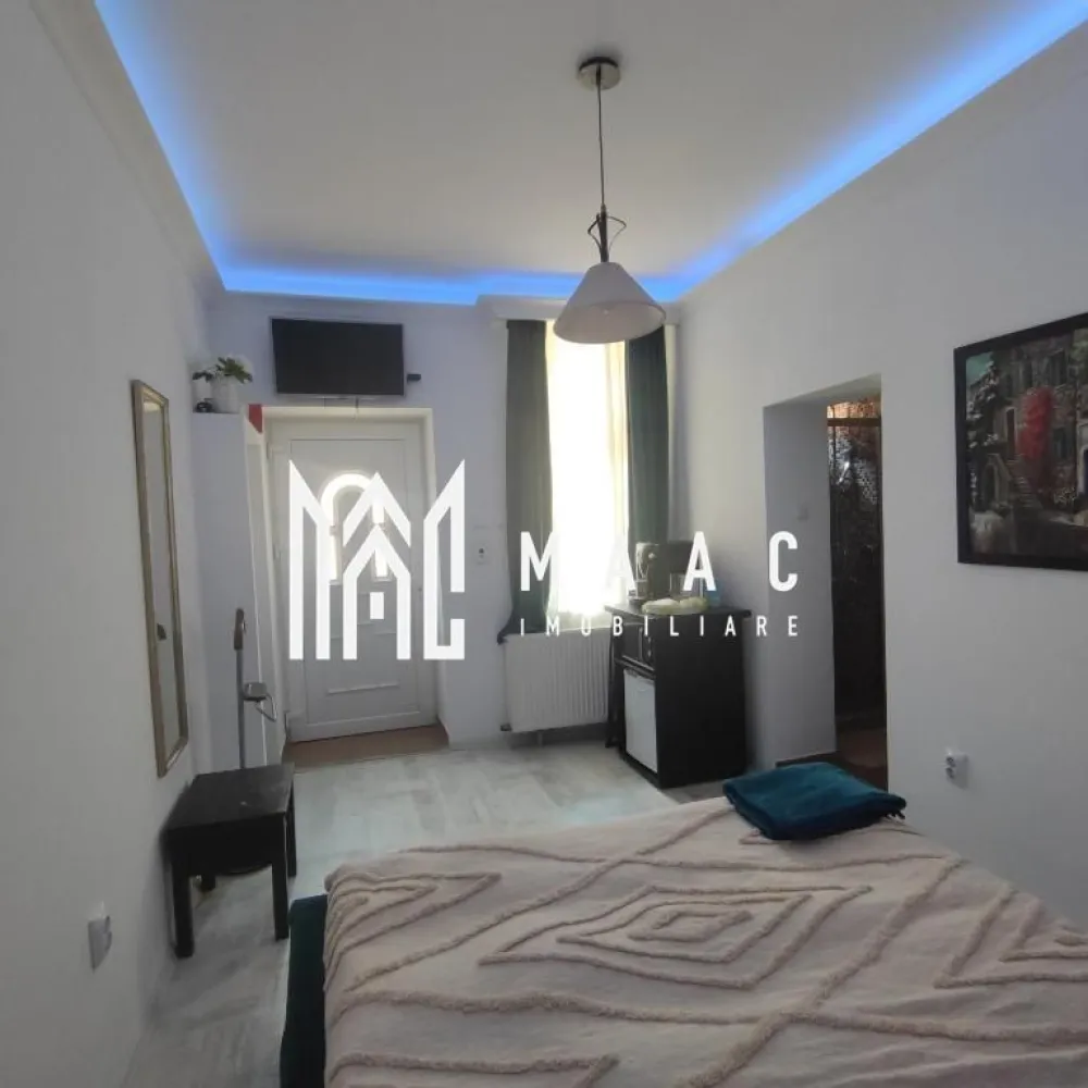 2 garsoniere | Ocazie investitie | Ultracentral - MAAC Imobiliare vă propune spre vânzare un spațiu situat ultracentral, într-o zonă cu trafic intens și vizibilitate foarte bună.

Proprietatea este utilizată în prezent în regim hotelier, însă datorită poziționării și compartimentării sale, poate fi folosită și ca spațiu comercial, birouri, cabinet, salon sau pentru alte activități.

Imobilul este înscris în CF ca apartament și este compartimentat în două garsoniere separate, fiecare cu intrare individuală – una la parter și una la etaj.

Spațiile sunt renovate complet și beneficiază de schimbare de destinație realizată la primărie.

Suprafața utilă este de 37 mp, la care se adaugă boxă la beci și boxă în pod.

Se vinde complet mobilat și utilat, exact ca în fotografii, fiind pregătit pentru utilizare imediată sau investiție.

Avantaje:

- locație ultracentrală
- potrivit pentru investiție
- ideal pentru regim hotelier, birouri sau activitate comercială
- două spații separate
- intrări individuale
- renovat complet
- boxă beci + boxă pod
- disponibil imediat

Pentru mai multe detalii sau programarea unei vizionări, nu ezitați să ne contactați specificand ID: CP3117958