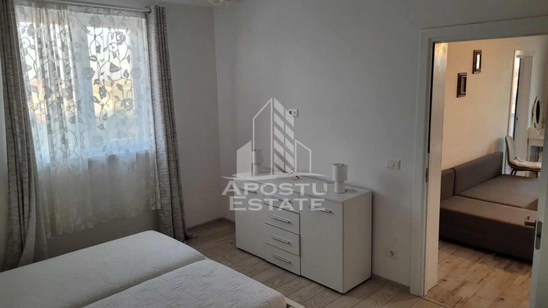 Apartament cu 3 camere, mobilat, cu gradina, in vatra satului Giroc