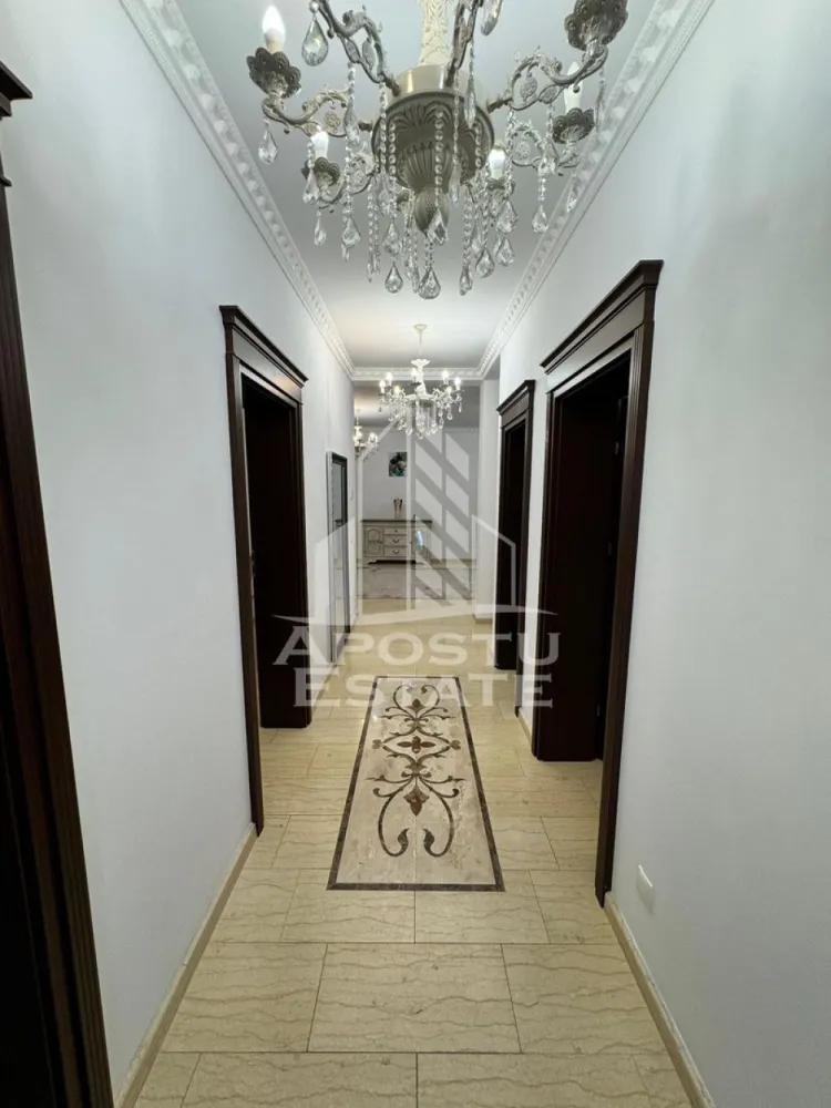 Duplex 5 camere de inchiriat,curte proprie, loc de parcare, Dumbravita - Agentia imobiliara APOSTU ESTATE va propune spre inchiriere un duplex spatios si elegant, cu 5 camere, situat intr-o zona linistita si bine conectata din Dumbravita, ideal pentru familii sau persoane care doresc un spatiu generos si confortabil.

Suprafata utila: 255mp
Compartimentare eficienta:

Hol de acces generos
Bucatarie complet mobilata si utilata, cu loc de luat masa
Living luminos si spatios
4 dormitoare mobilate si utilate complet
Baie principala cu cada si geam pentru ventilatie naturala
Baie scundara cu dus

Confort si facilitati:
Centrala termica proprie pe gaz
Aer conditionat
Terasa acoperita
Loc de parcare inclus in pret

Duplexul este complet mobilat si utilat

Localizare: Zona Dumbravita – liniste, acces facil spre oras, in apropiere de magazine, scoli si mijloace de transport in comun.

Ideal pentru:
Familii
Cupluri
Profesionisti care lucreaza remote sau au nevoie de birou acasa

Pret chirie: 1350 euro
Programeaza o vizionare!
ID intern: CP2800994