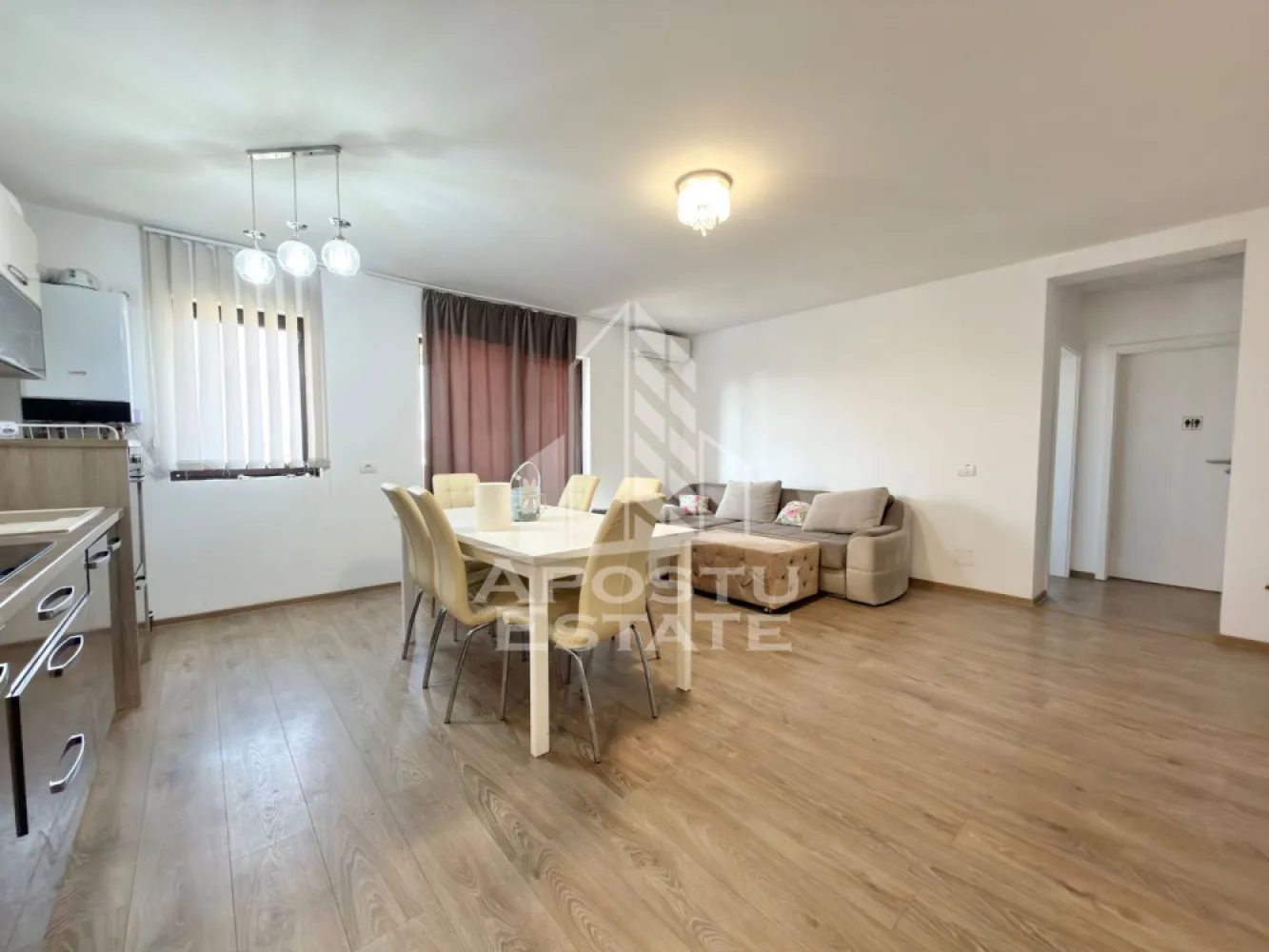 Apartament cu 3 camere complet mobilat si utilat la etajul 2 in Giroc. - APOSTU ESTATE va propune spre vanzare un apartament cu 3 camere situat in Giroc - Chisoda.
In apropiere sunt magazine si supermarket-uri precum: Lidl, Profi, magazin alimentar la o distanta de 5-10 minute, acces facil la mijloace de transport in comun.

Apartamentul se vinde complet mobilat si utilat precum se observa in imagini. 
Imobilul este situat la etajul 2.
Suprafata este de 63 mp utili + terasa.

Compartimentare:
- hol acces.
- living si bucatarie open space.
- 2 dormitoare.
- baie cu geam si dus.
- terasa.

Detalii tehnice:
- constructie realizata in anul 2021 din caramida Porotherm de 25 cm.
- exterior izolat cu polistiren de 10 cm eps 80. 
- electrocasnice noi, in stare perfecta de functionare: (plita electrica, cuptor, masina de spalat vase, masina de spalat rufe, clima).
- geamuri termopan, pentru izolare fonica si termica superioara, foarte mari si luminoase.
- aparat pentru aer conditionat in living.
- centrala proprie pe gaz, sistem eficient de incalzire prin pardoseala.
- aparataje modulare Gewis.
- usa acces securizata, usi interioare porta doors albe.
- 1 loc de parcare.

Utilitati complete: curent, apa de la retea, canalizare, gaz, internet prin fibra optica, cablu Tv.
Pretul este negociabil.
Pentru mai multe detalii nu ezitati sa ne contactati!

Acceptam orice fel de credit bancar. Oferim consultanta si solutii financiare prin colaboratorii nostri pentru a obtine cel mai avantajos credit Ipotecar sau Noua Casa.

Va asteptam cu drag la o vizionare chiar astazi!
CP2993853