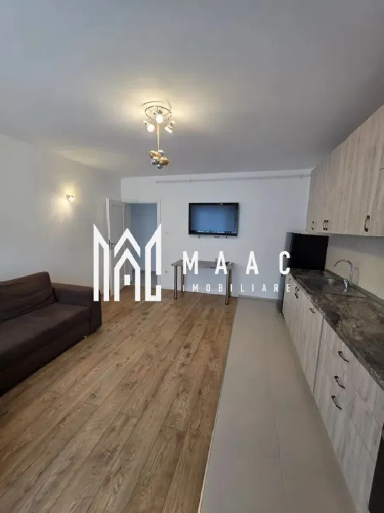 Apartament 3 Camere I Decomandat I Selimbăr - Maac Imobiliare oferă spre închiriere un apartament de 3 camere, luminos, situat în Șelimbăr in apropiere de Shopping City Apartamentul este compus dintr-un living open-space cu bucatarie, 2 dormitoare, baie, 2 balcoane deschise și debara. Se predă mobilat și utilat. Se închiriază pe minim 12 luni. Se percepe garanție in cuantumul unei chirii lunare. Pentru mai multe detalii sau pentru a programa o vizionare, vă rugăm să specificați ID-ul prin telefon: CP2877447 }}