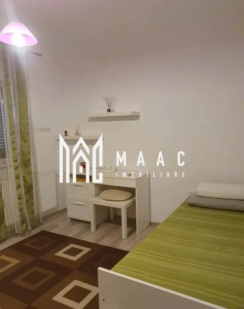 Apartament 3 camere | 76 MPU | Etaj 2 | Arhitectilor - Sibiu - MAAC Imobiliare va propune spre vânzare un apartament spațios și bine compartimentat, situat în Cartierul Arhitecților, Sibiu, la etajul 2 din 2 al unui imobil construit în anul 2015.

Apartamentul are o suprafață utilă de 76 mp și oferă un spațiu confortabil, potrivit atât pentru o familie, cât și pentru cei care își doresc o locuință practică și complet echipată.

Compartimentarea este eficientă și include:

living generos
2 dormitoare
bucătărie separată
2 băi
dressing
debara
2 balcoane
pod propriu, ideal pentru depozitare suplimentară

Locuința se vinde complet mobilată și utilată, fiind pregătită pentru mutare imediată.

Dotările incluse sunt:

mașină de spălat haine
mașină de spălat vase
frigider
aragaz/cuțptor
mobilier și electrocasnice

În preț este inclus și un loc de parcare.

Localizare și avantaje

acces facil către magazine și puncte de interes
stație pentru transport public
zonă în continuă dezvoltare și foarte căutată

Apartamentul reprezintă o alegere foarte bună pentru cei care caută confort, spațiu și funcționalitate într-o zonă apreciată, cu acces facil către oraș și principalele puncte de interes.
Pentru mai multe detalii sau pentru programarea unei vizionări, vă rugăm să ne contactați și să menționați ID-ul proprietății; CP3051684.