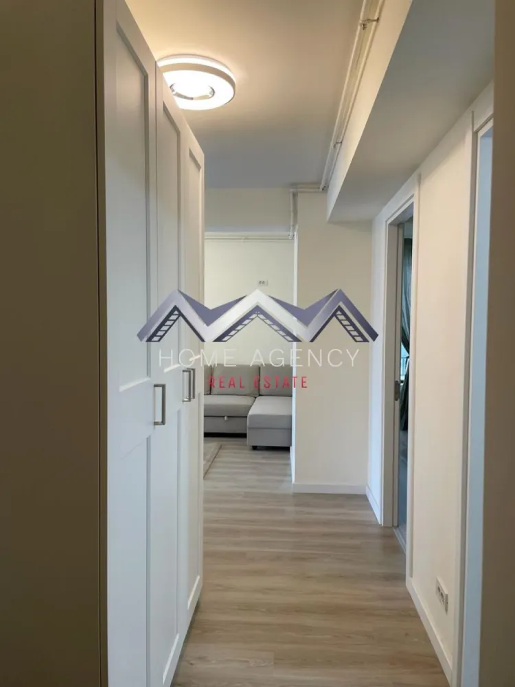 Apartament 2 camere - Et 1 - Lift - Parcare subterana - Otopeni central - Vă invităm să descoperiți o proprietate superbă, spre vanzare, disponibilă imediat: un apartament de 2 camere cu încălzire în pardoseală foarte cochet, utilat și mobilat complet, situat la etajul 1/3, într-un bloc nou (cu lift) din Otopeni.

Apartamentul este foarte luminos, foarte spațios și foarte bine compartimentat, având un living, o bucătărie deschisă, un dormitor, o baie și un balcon.

De la primii pași în această proprietate găsim un loc care oferă confort și liniște. Apartamentul se predă COMPLET utilat și mobilat, inclusiv: cuptor cu microunde, aparat de cafea, mașină de spălat rufe, mașină de spălat vase, bideu, A/C etc. 

Apartamentul beneficiază de parcare subterană cu barieră, supraveghere video și acces facil către centrul orașului, la doar 5 minute de mers pe jos față de Primăria Otopeni.

Proiectul este destinat celor care sunt în căutarea mix-ului perfect între standarde de calitate superioară, funcționalitate, confort și intimitate, într-o zona liniștită a orașului Otopeni.

Programează-te acum pentru o vizionare!

Dacă aveți o proprietate de vânzare/închiriere sau sunteți interesați de o proprietate aflată în portofoliul agenției noastre, vă rugăm să ne contactați la numărul de telefon din anunț sau pe adresa de email contact@homeagency.ro.