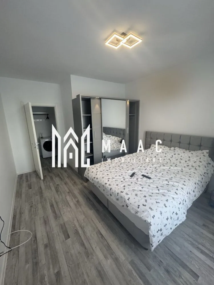 Apartament 2 Camere | 52 MPU | Loc de Parcare Privat - MAAC Imobiliare vă propune spre închiriere un apartament modern cu 2 camere, situat în ansamblul rezidențial Valetta Park, în zona Calea Șurii Mici. 

Caracteristici principale

• suprafață utilă de 52 mp
• etaj 4 într-un imobil dotat cu lift
• compartimentare decomandată
• complet mobilat și utilat
• disponibil pentru mutare imediată

Compartimentare și dotări

• living 
• dormitor complet mobilat
• bucătărie modernă și complet utilată
• baie
• mașină de spălat rufe
• aer condiționat
• hotă

Localizare și accesibilitate

• aproximativ 10 minute până în centrul orașului
• acces rapid către Zona Industrială Vest
• conexiune facilă către Aeroportul Internațional Sibiu
• acces rapid la principalele artere de circulație
• zonă în continuă dezvoltare, cu multiple facilități în apropiere

 Pentru mai multe detalii sau pentru programarea unei vizionări, vă rugăm să ne contactați și să menționați ID-ul proprietății: CP3114876.