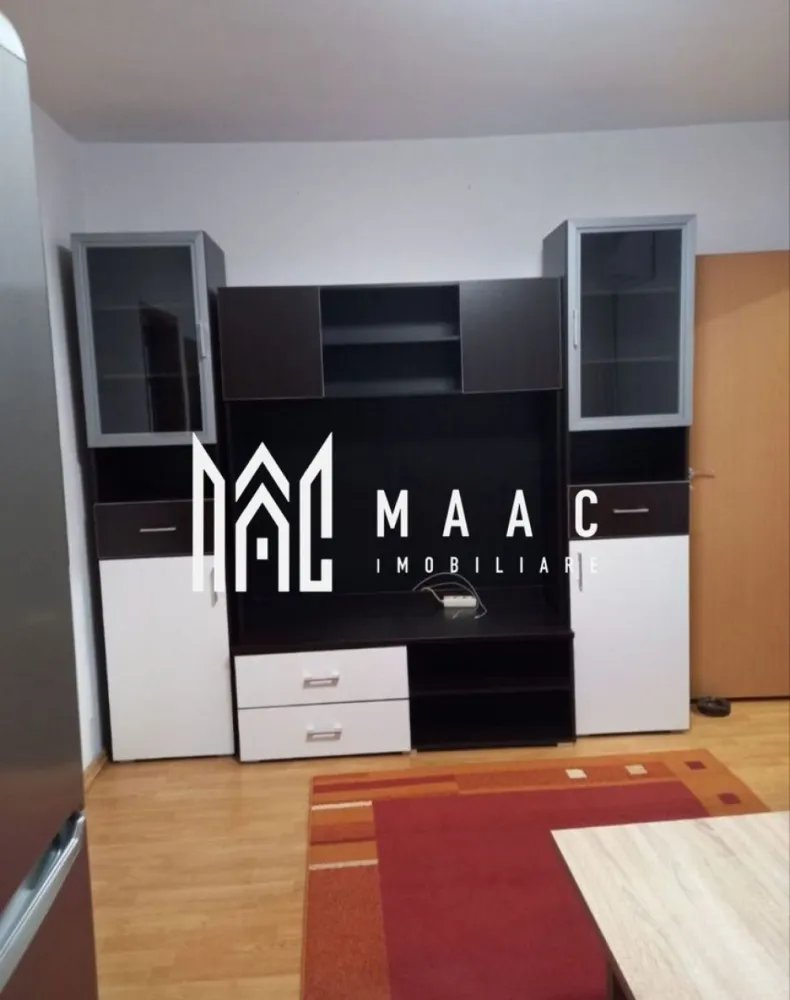 Apartament 2 camere | Mihai Viteazu | Mobilat și utilat | Disponibil imediat | - MAAC Imobiliare vă propune spre închiriere un apartament cu 2 camere semidecomandate, având o suprafață utilă de 36 mp, situat la etajul 4 al unui imobil cu 5 etaje, în zona Mihai Viteazu, în apropierea Colegiul Pedagogic Andrei Șaguna.

Apartamentul este compartimentat practic și este format din:
- living
- dormitor
- bucătărie
- baie
- hol
- cămară

Locuința se închiriază complet mobilată și utilată, fiind disponibilă imediat. 

Poziționarea excelentă oferă acces rapid către stații de autobuz, școli, grădinițe, magazine, farmacii și alte puncte de interes, ceea ce îl face potrivit atât pentru o persoană, cât și pentru un cuplu sau o familie tânără.

Garanție: echivalentul unei chirii

Pentru mai multe detalii sau programarea unei vizionari, nu ezitați să ne contactați specificând ID: CP3129154