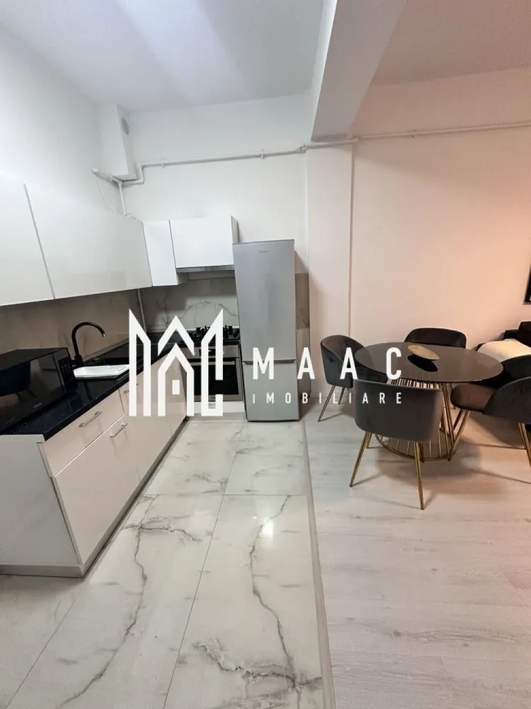 Apartament 2 camere| Finisat modern | Doamna Stanca - Maac Imobiliare propune spre vânzare un apartament cu 2 camere, situat în ansamblul Azur Residence, Doamna Stanca – o zonă în continuă dezvoltare, ideală atât pentru locuit, cât și pentru investiție.

Situata la parter înalt, intr-un imobil finalizat in 2019, locuinta are o bucatarie open-space cu livingul, un dormitor, baie cu dus.

Complet mobilat, modern, cu finisaje de calitate și un design interior ce aduce o nota de confort si echilibru.
In pret este cuprins si un loc de parcare spațios – 30 mp, prins in CF.

Pentru mai multe detalii va rugam specificati telefonic ID: CP2744994