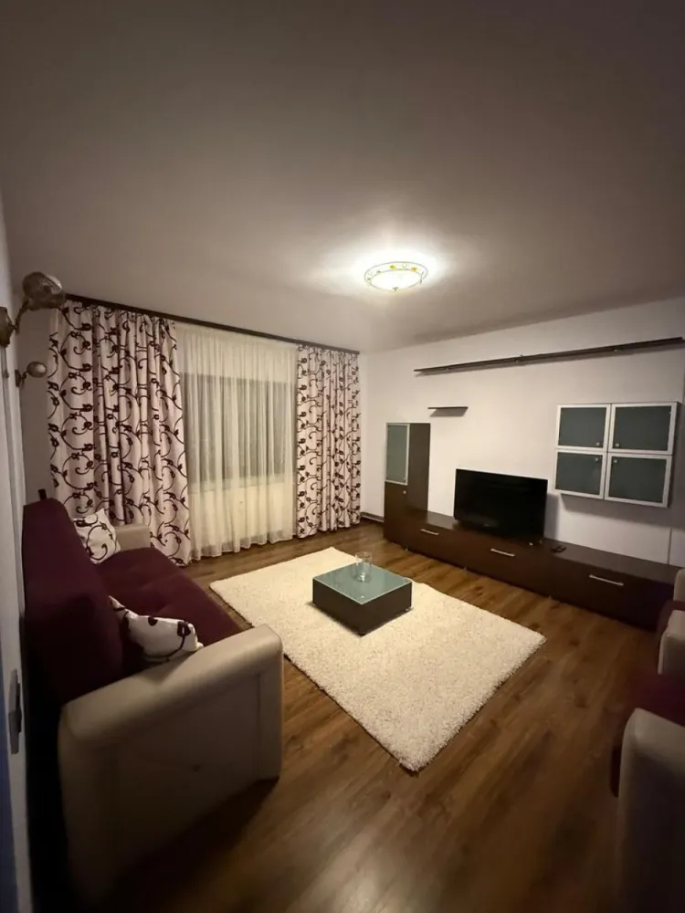Rahova Str Doina apartament 2 camere mobilate si centrala termica - K Imobiliare propune spre închiriere apartament cu 2 camere decomandat, situat pe Strada Doina, în cartierul Rahova, într-o zonă liniștită, cu acces facil către mijloace de transport, magazine, școli și alte puncte de interes.

Apartamentul este spațios, modern și foarte bine întreținut, fiind complet mobilat și utilat, gata pentru mutare imediată. Locuința beneficiază de centrală termică proprie, oferind confort și costuri reduse la întreținere pe tot parcursul anului.

Dotări și beneficii:
✔ 2 camere decomandate
✔ Living generos și luminos
✔ Bucătărie complet mobilată și utilată, cu zonă de dining
✔ Dormitor confortabil
✔ Baie modernă cu cadă tip jacuzzi
✔ Centrală termică proprie
✔ Mobilier modern și funcțional
✔ Electrocasnice incluse
✔ Finisaje de calitate
✔ Disponibil imediat
