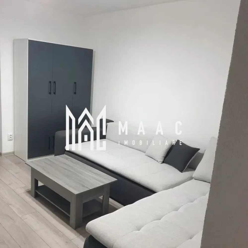 Garsonieră | Etaj 8 | Balcon | Renovata | Central - MAAC Imobiliare vă propune spre închiriere o garsonieră situată în zona centrală a orașului Sibiu, aproape de principalele puncte de interes ale orașului.
Locuința este recent renovată, complet mobilată și utilată, fiind pregătită pentru mutare imediată.

Detalii garsonieră
Garsonieră complet mobilată și utilată
Recent renovată
Compartimentare practică și eficientă
Ideală pentru o persoană sau un cuplu
Dotări și avantaje
Bloc complet reabilitat
Lift schimbat
Izolație exterioară cu vată bazaltică
Costuri reduse de întreținere
Locuință luminoasă și bine întreținută
Avantaje locație
Zonă centrală Sibiu
Aproape de:
magazine
restaurante și cafenele
transport public
facultăți și instituții
centre comerciale și puncte de interes
Condiții închiriere
Nu se acceptă animale de companie

Pentru informații suplimentare, menționează codul ID: CP3080949