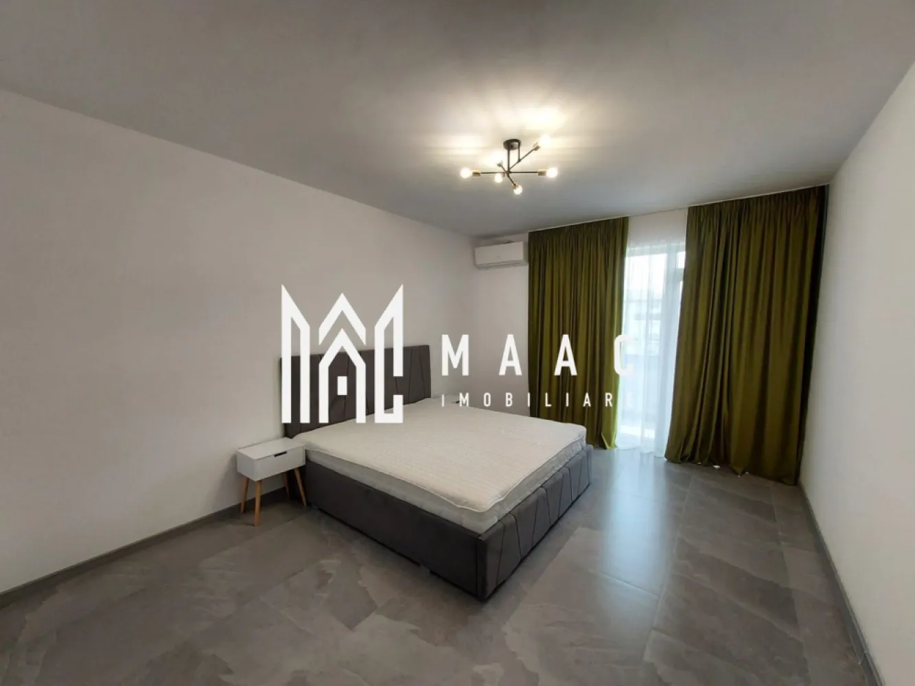 Apartament 2 Camere | Parcare | Etaj 1 | Pictor Brana - MAAC Imobiliare vă propune spre închiriere un apartament cu 2 camere decomandate, aflat la prima închiriere, ideal pentru cei care își doresc confort, funcționalitate și un spațiu modern pregătit pentru mutare imediată.

Apartamentul are o suprafață utilă de 62 mp, este situat la etajul 1 și beneficiază de un balcon, oferind un spațiu generos și bine compartimentat.

Locuința se predă complet mobilată și utilată, cu mobilier și electrocasnice pregătite pentru utilizare, fiind o alegere excelentă pentru un cuplu, o familie sau persoane care își doresc un apartament modern și confortabil.

Compartimentare
Living spațios
Dormitor
Bucătărie
Baie
Hol
Balcon
Dotări și beneficii
Prima închiriere
Compartimentare decomandată
Complet mobilat și utilat
Mașină de spălat rufe
Mașină de spălat vase
Etaj 1
Balcon
Loc de parcare inclus
Avantaje
Apartament luminos și bine întreținut
Mobilier și electrocasnice în stare excelentă
Costuri reduse de întreținere
Disponibil imediat
Potrivit pentru persoane care caută confort și liniște

Pentru mai multe detalii și programarea unei vizionări, vă rugăm să ne contactați menționând ID: CP3130137