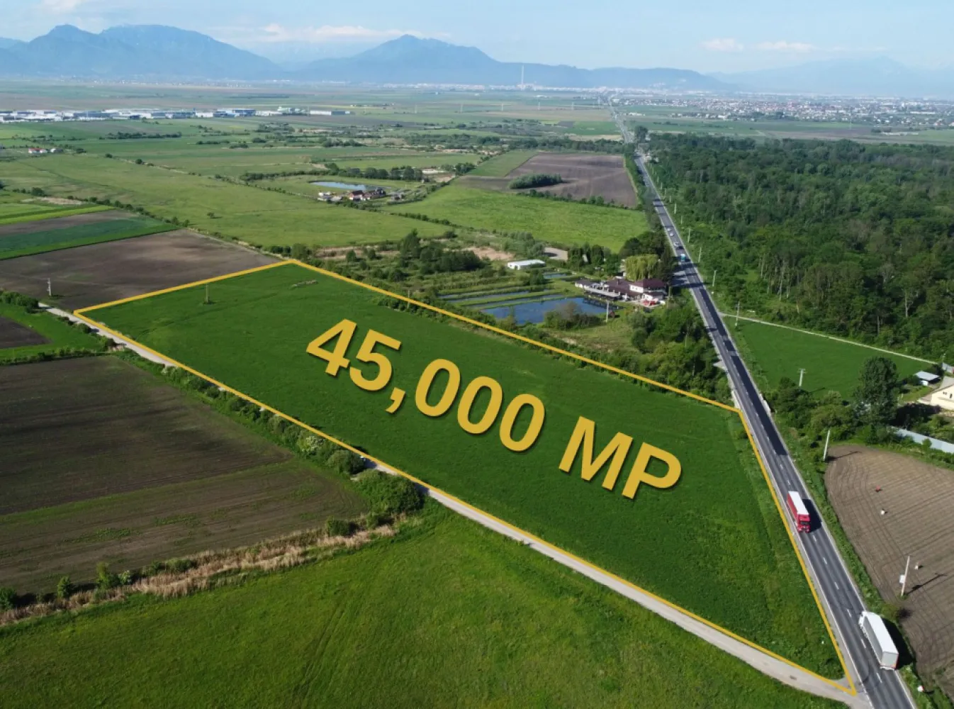 Industrial Land for Sale ROMANIA - BRASOV | 45,000 sqm - 45,000 sqm PUZ Approved Industrial Land near Brașov, Romania
Exceptional investment opportunity in one of Brașov's most promising industrial and logistics corridors.

Located in Prejmer – Lunca Câlnicului, this 45,000 sqm intravilan land parcel benefits from direct access to DN11 and excellent connectivity to Brașov, regional transport routes, and Brașov-Ghimbav International Airport.
Key Property Highlights
Land Area: 45,000 sqm
Intravilan Land
PUZ Approved
Designated for Logistics, Warehousing, Offices & Light Industrial Development
POT: 35%
CUT: 0.6
Maximum Building Height: 12 m ridge / 10 m cornice
Direct DN11 Frontage
Dual Road Access
Land Book Extract Available
No Encumbrances
Urbanism Certificate Issued
Strategic Location
8 minutes to Brașov City Entry
Approximately 12 minutes to Brașov City Centre
Approximately 17 minutes to Brașov-Ghimbav International Airport
Excellent access to regional and national transportation networks
Ideal For
Logistics & Distribution Centers
Warehousing Facilities
Light Manufacturing
Business & Office Parks
Commercial Service Facilities
Long-Term Industrial Investment Projects

The property offers a rare combination of approved planning documentation, strategic road access, and proximity to one of Romania's fastest-growing regional economies.
Investment Opportunity
With approved urban planning parameters and a flexible development profile, the site is well suited for both owner-occupiers and institutional investors seeking industrial or logistics development opportunities in the Brașov metropolitan area.
Disclaimer

All development visualizations, logistics park concepts, masterplans and renderings presented in the marketing materials are illustrative only and are intended to demonstrate potential development scenarios. Any future development remains subject to detailed design, permitting procedures, technical studies and applicable urban planning regulations.
