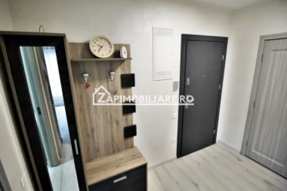 Apartament 1 camera in bloc NOU,46 mp,1 parcare privată