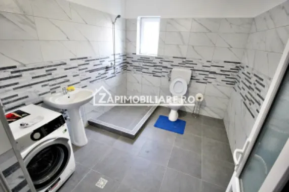 Casa 4 camere,4 bai,1 bucatarie,1 living,120 mp,500mp teren